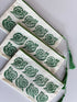Hand Printed Zip Pouch with Green Snail Design.