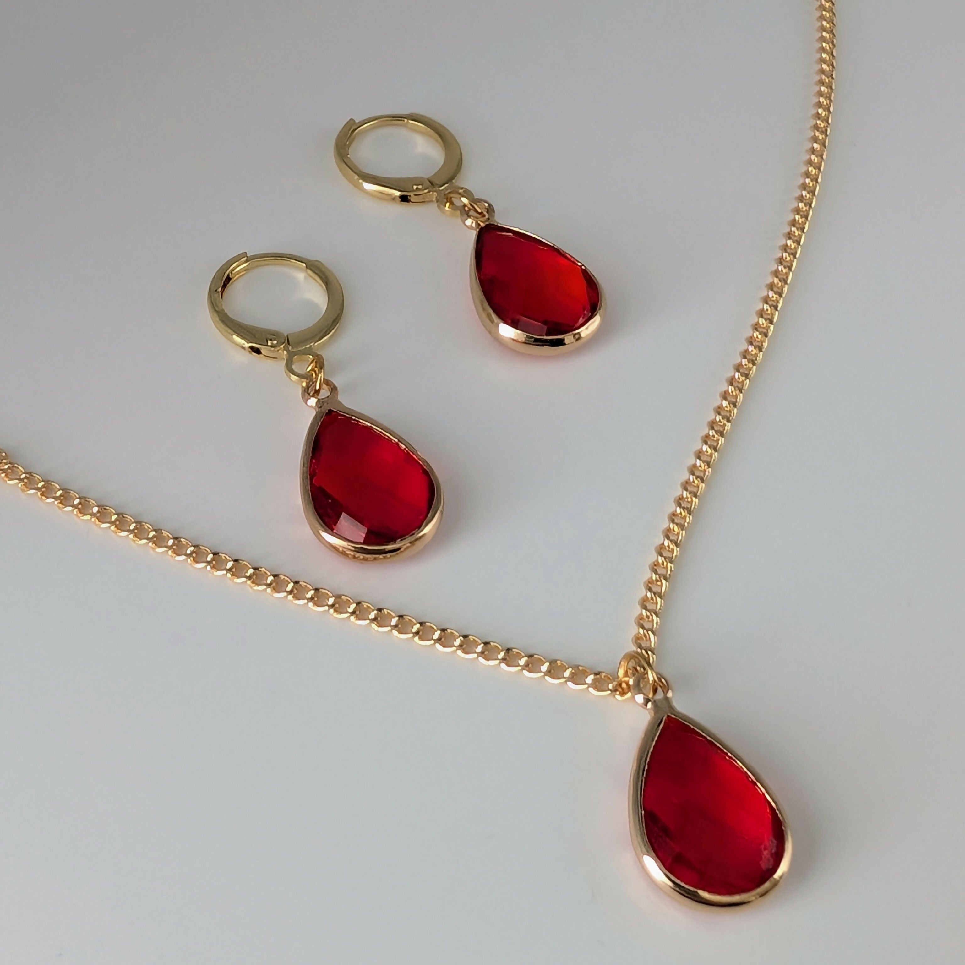 Vibrant Red Faceted Crystal Teardop Charm Necklace on a Gold Plated Chain