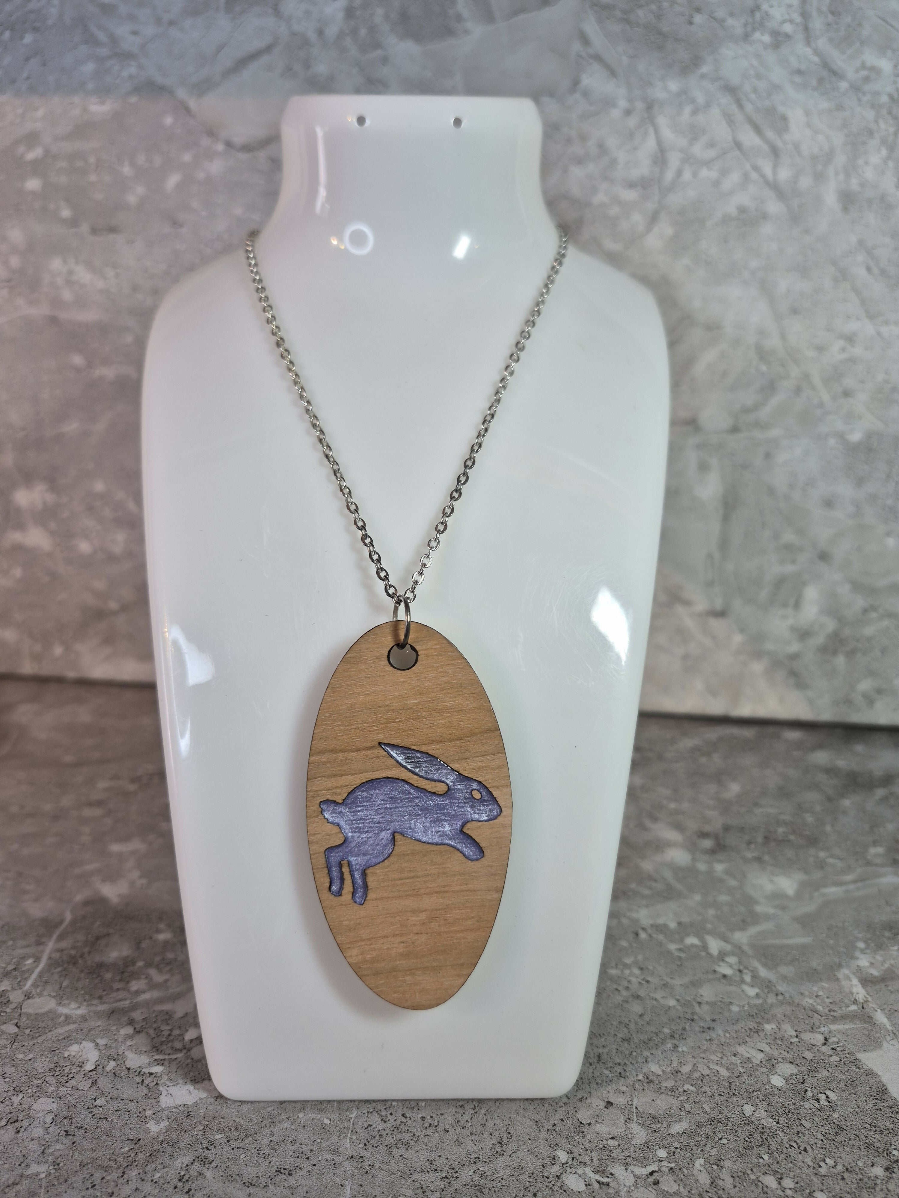 Unique Handcrafted Oval Pendant With An Engraved Leaping Hare
