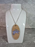 Unique Handcrafted Oval Pendant With An Engraved Leaping Hare