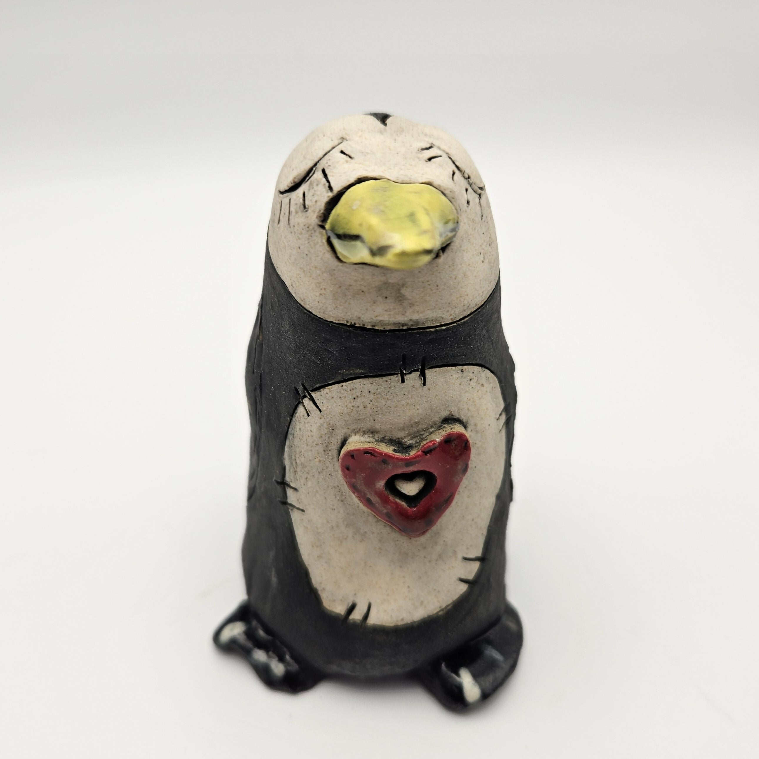 CHARMING CERAMIC PENGUIN.