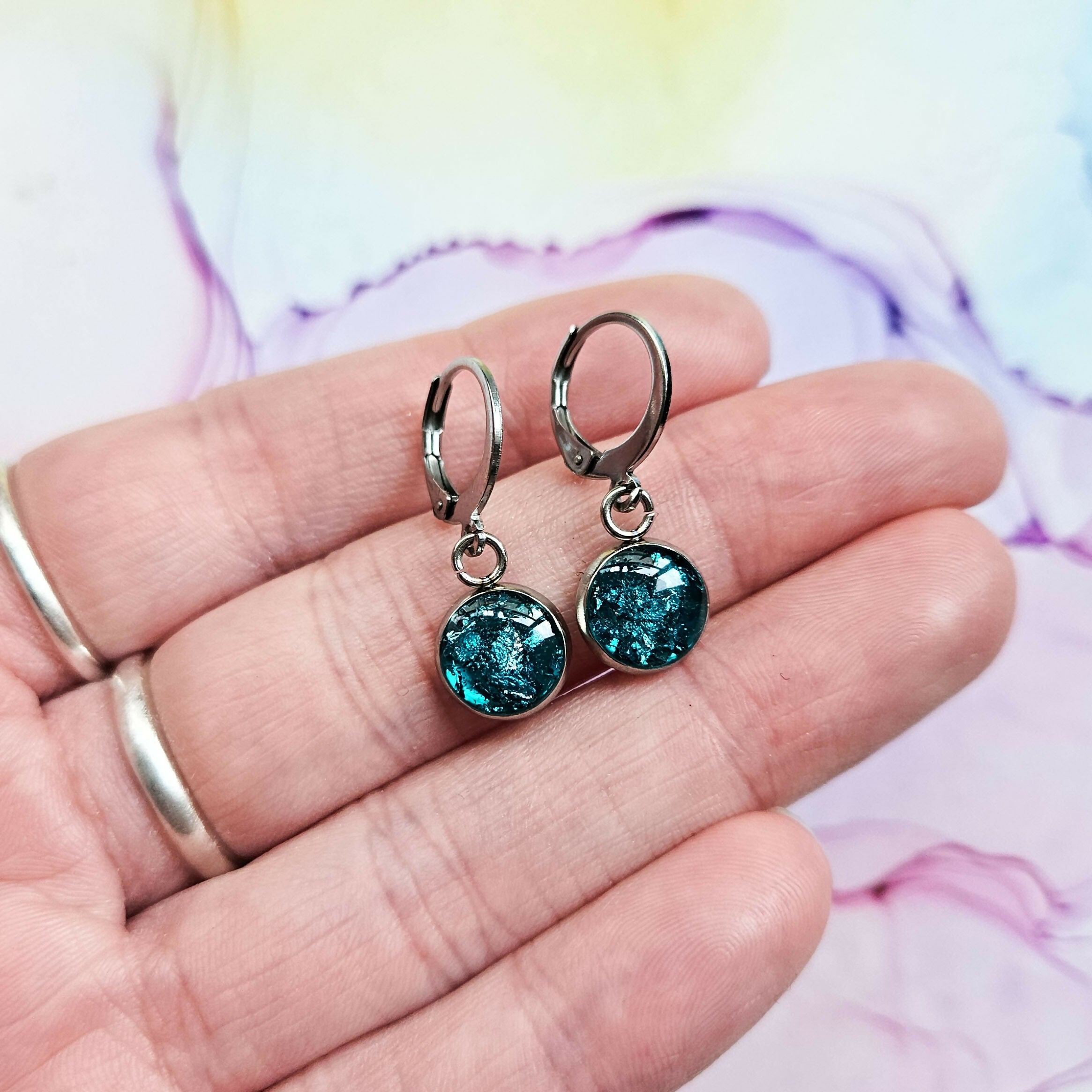 Handmade Teal And Silver Resin Charms On Huggie Hoops