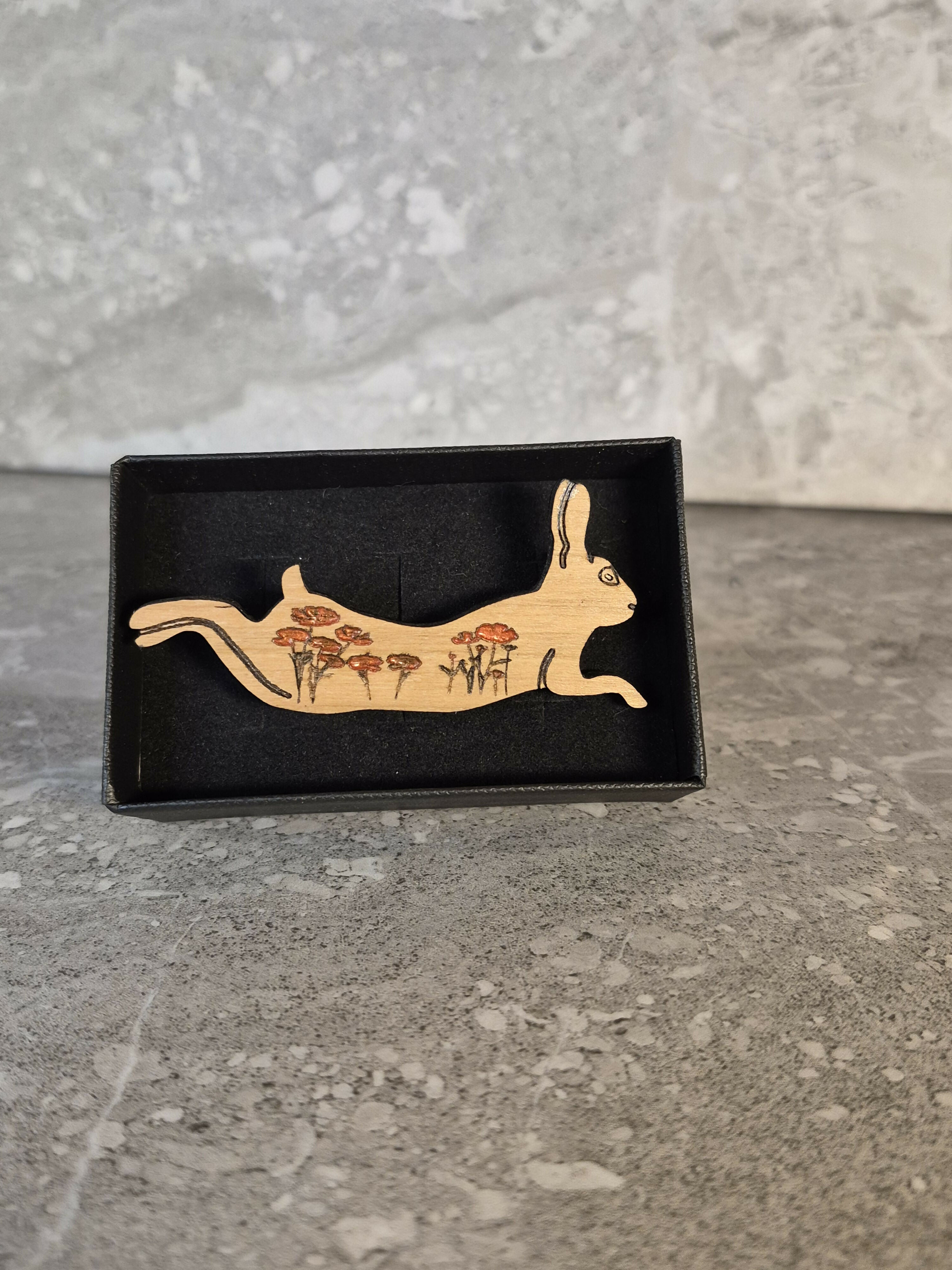 Handcrafted Cherry Veneered Leaping Hare Pin with Flower Decoration