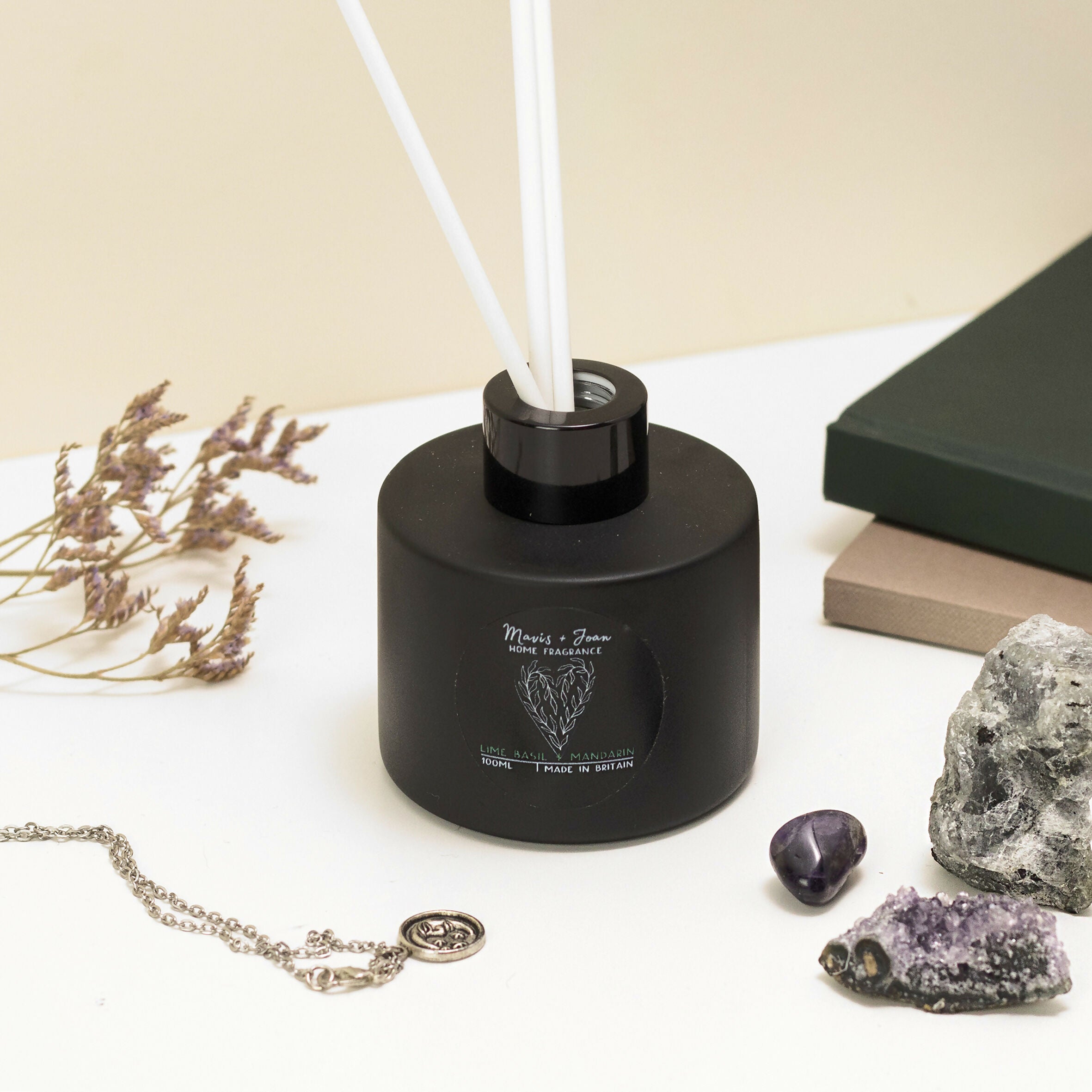 Reed Diffuser with black glass bottle and white reeds