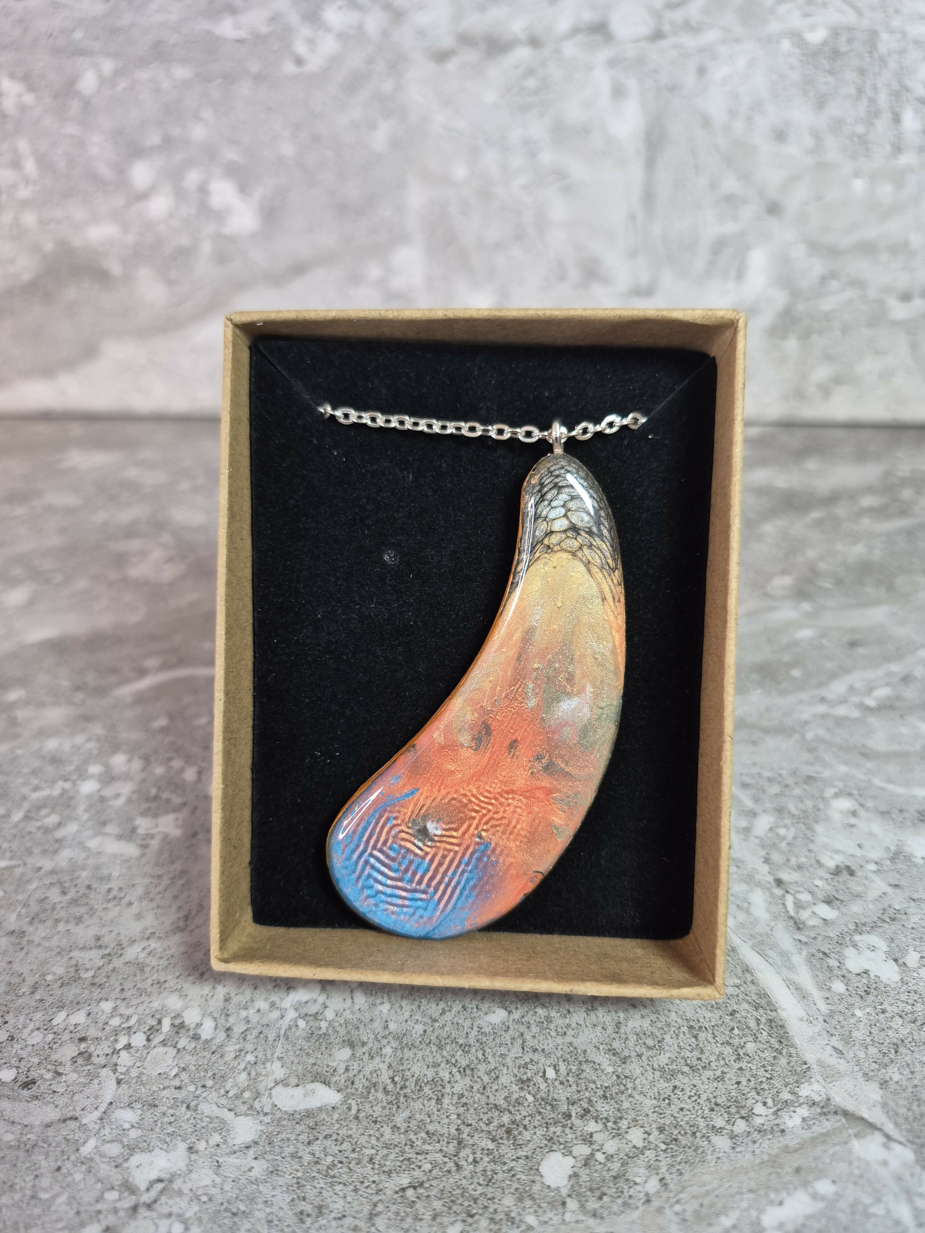 Unique Hand Crafted Tear Drop Shaped Pendant With a Fiery Textured Pattern
