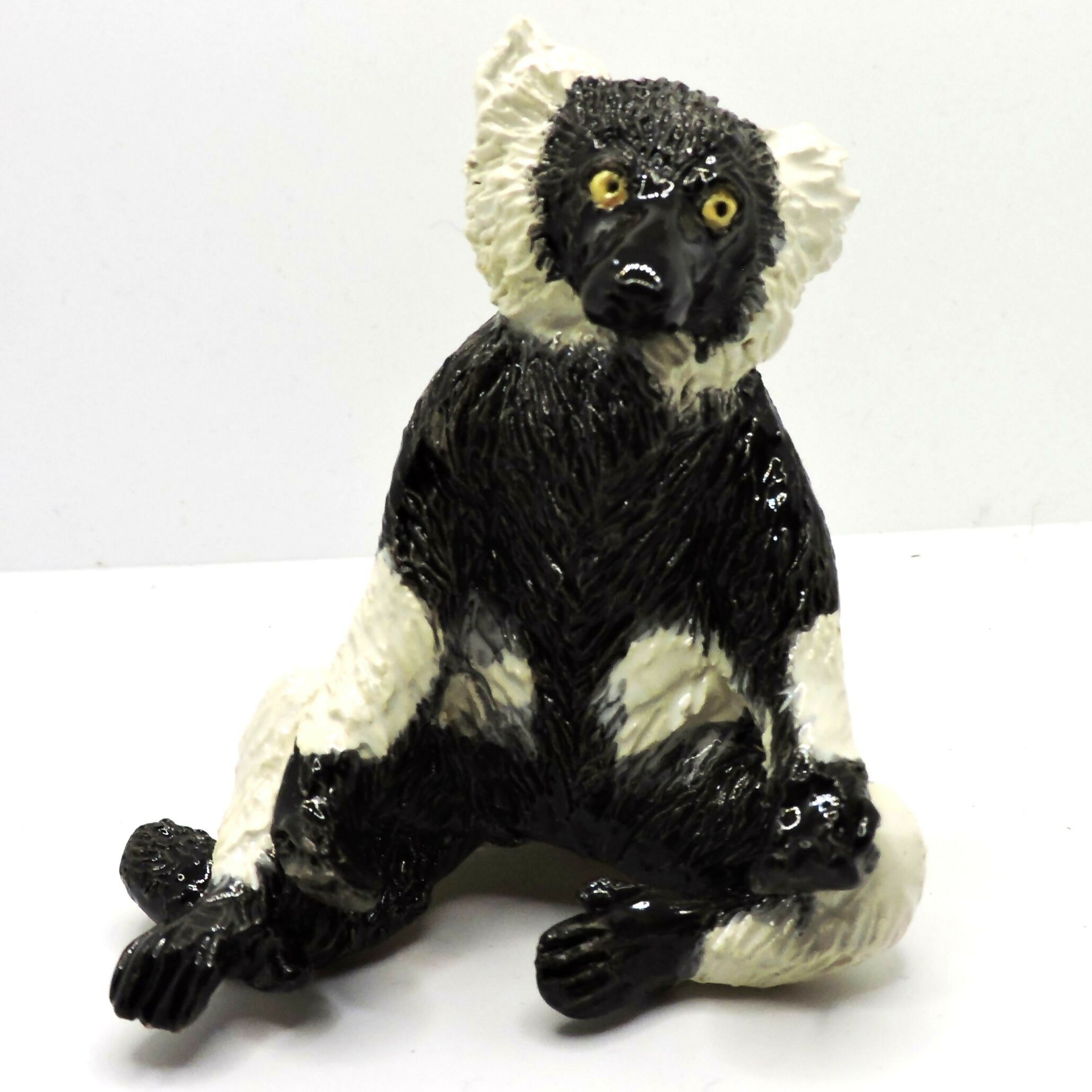 Ceramic Black and white ruffed lemur sculpture