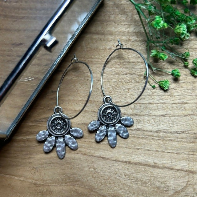 Silver Plated Hoops Featuring Abstract Flower Charms
