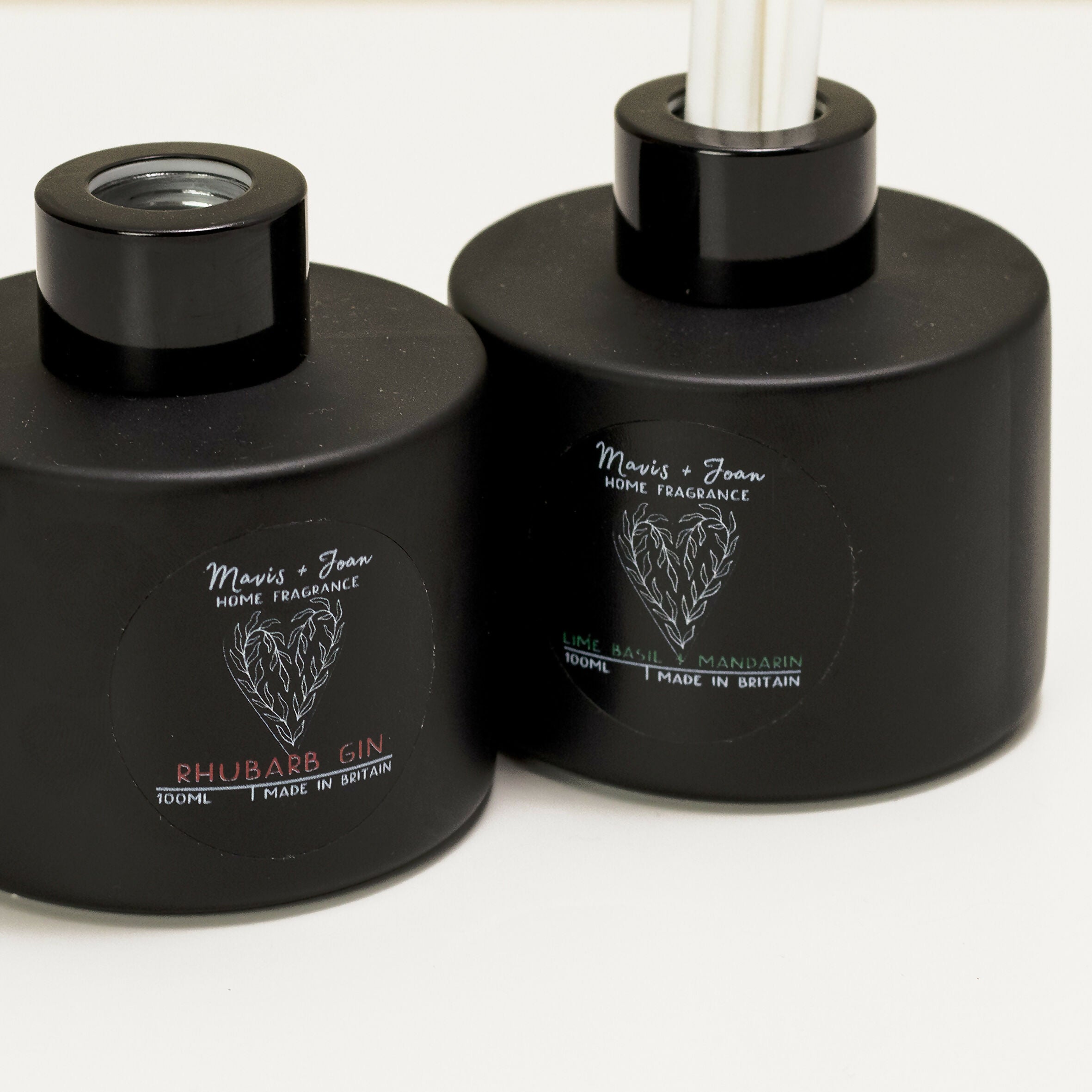 Reed Diffuser with black glass bottle and white reeds
