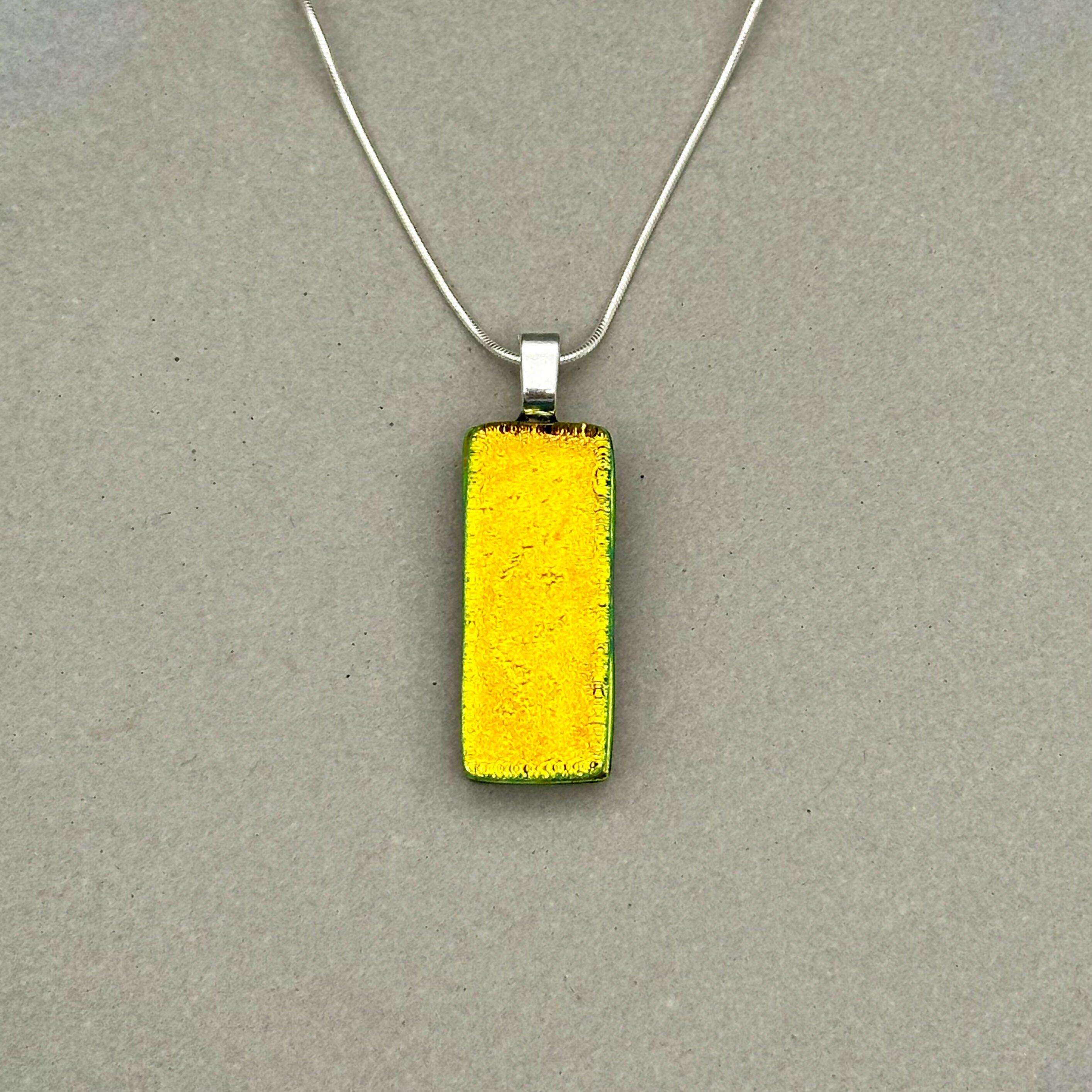 Orange Dichroic Fused Glass Pendant with Silver Plated Chain - Handmade by Jade Tapson Glass.