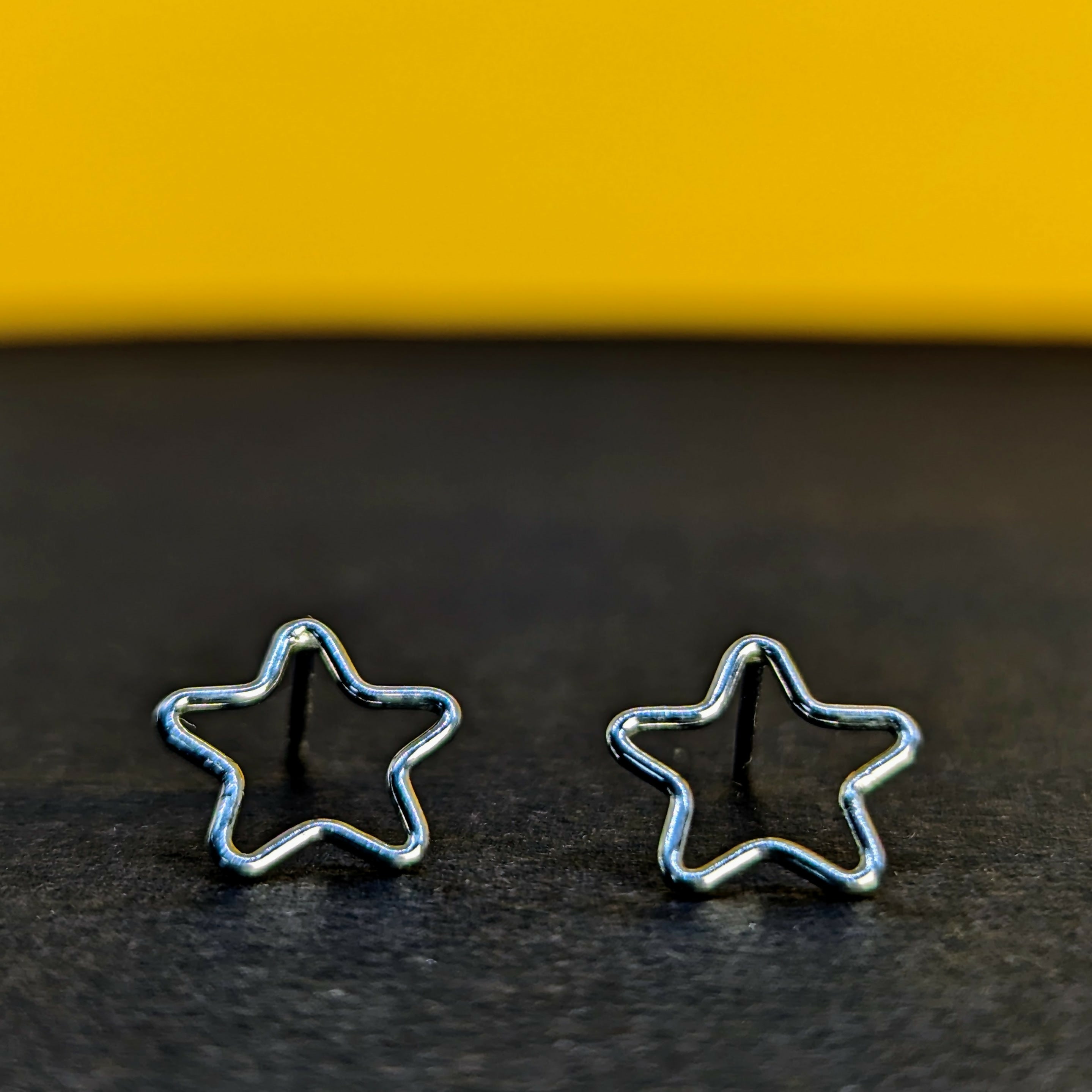 ‘Starlight’ Sterling Silver Small open Star Stud Earring