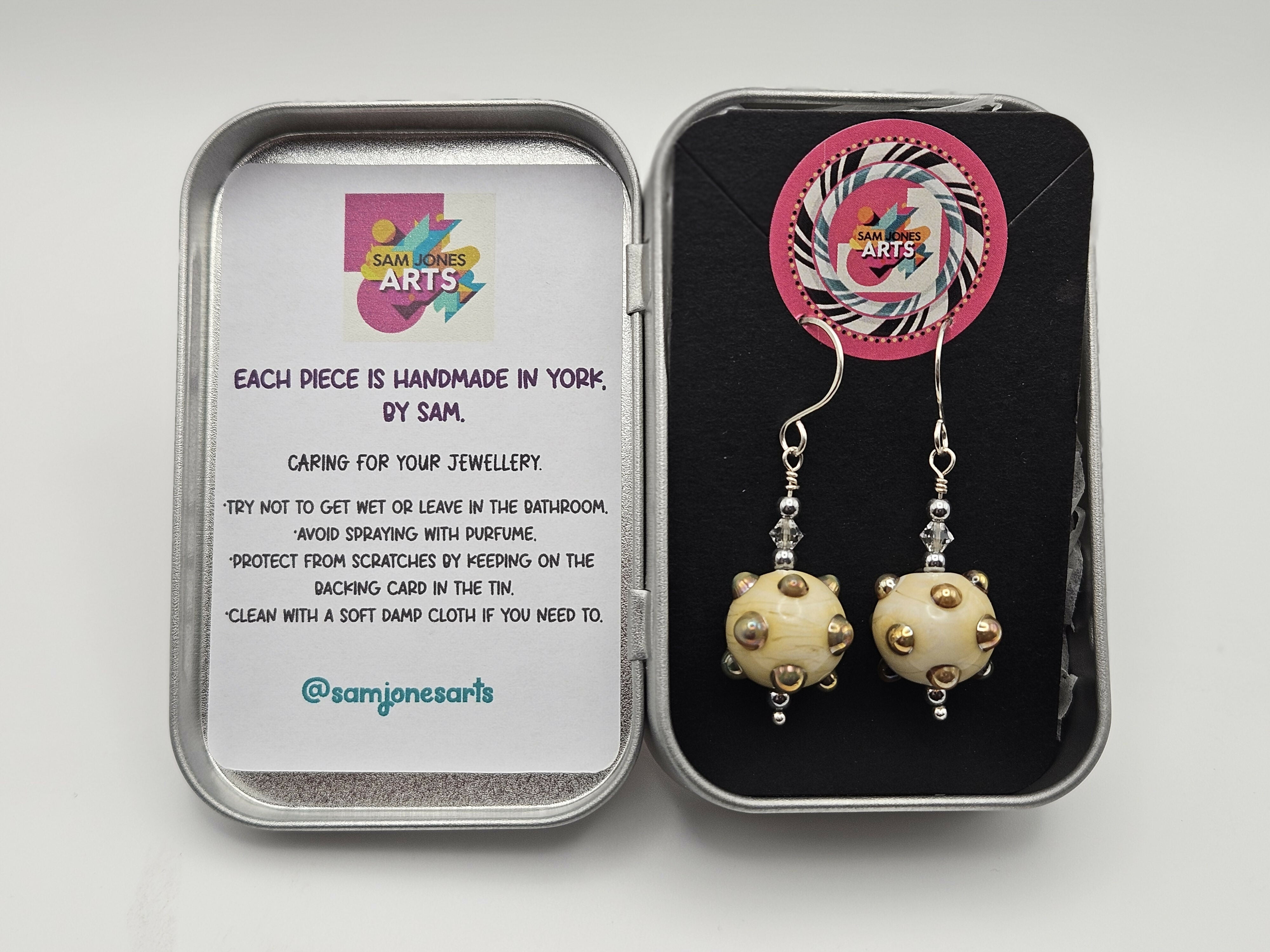 HAND LAMPWORKED GLASS EARRINGS WITH GOLD LUSTER BOBBLES, WITH STERLING SILVER EAR WIRES AND SWAROVSKI CRYSTALS.