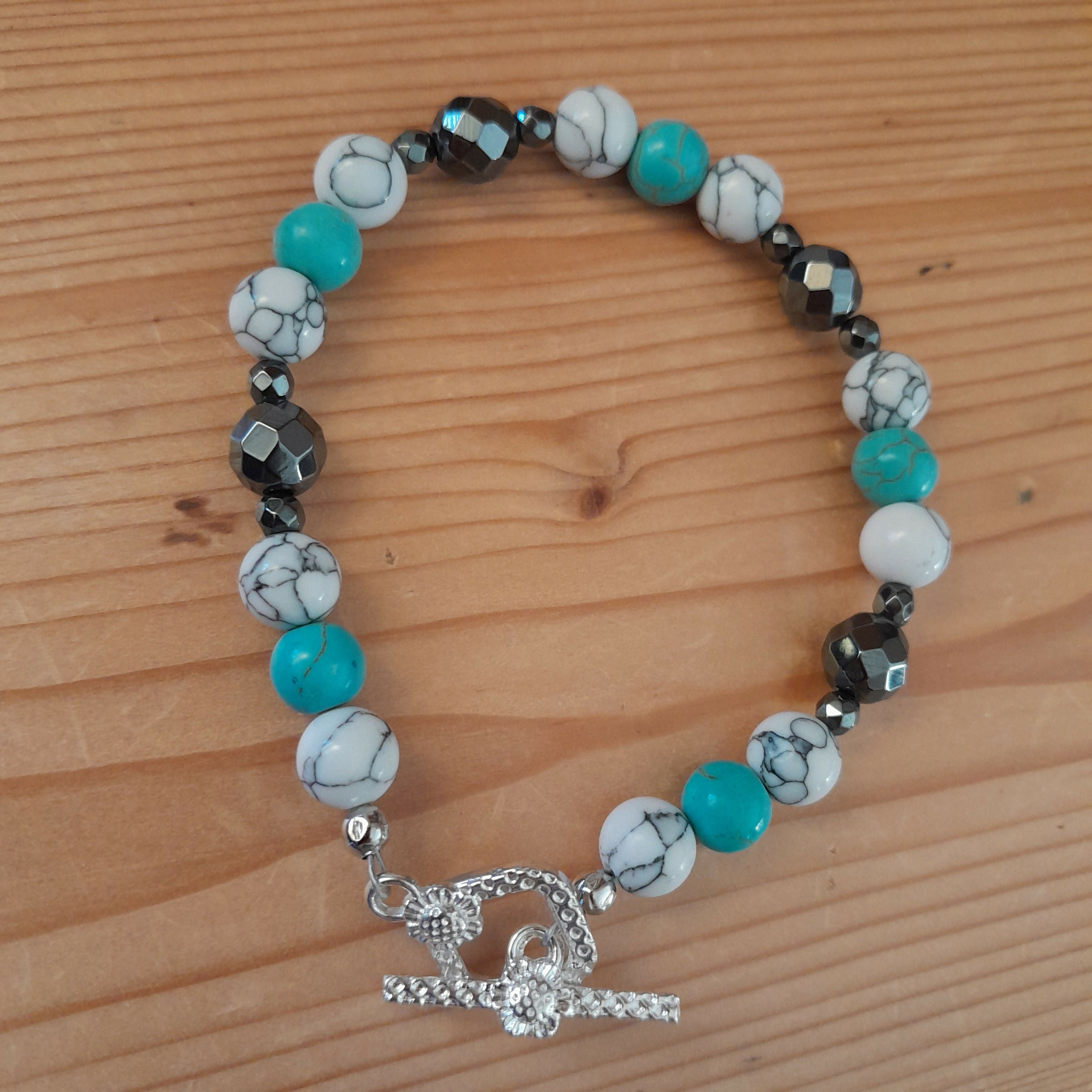 Tibetan Silver Toggle Catch Bracelet with Grey Veined Howlite, Turquoise & Faceted Grey Hematite.