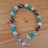 Tibetan Silver Toggle Catch Bracelet with Grey Veined Howlite, Turquoise & Faceted Grey Hematite.