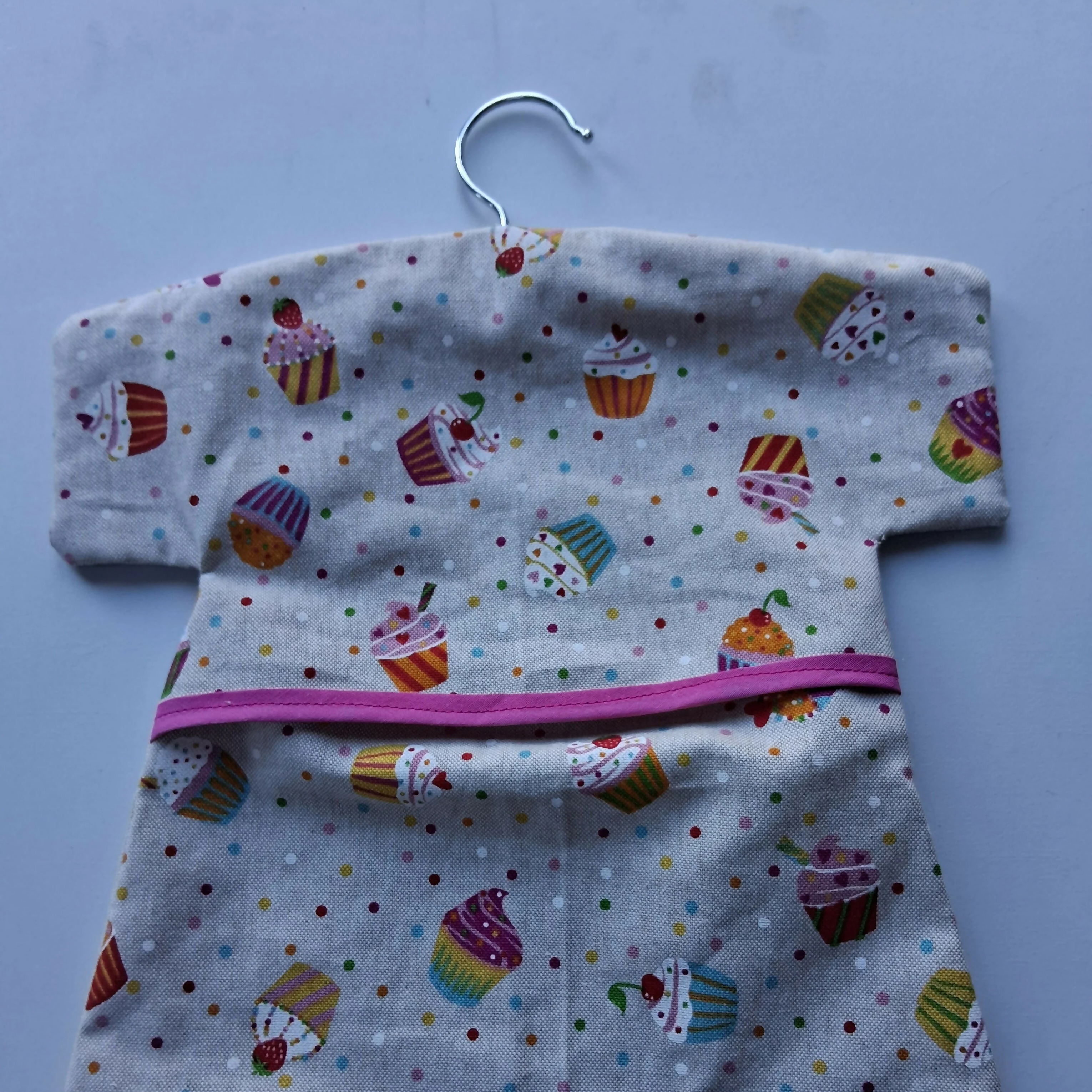 Beautiful handmade traditional peg bag in Cupcake fabric with wooden hanger