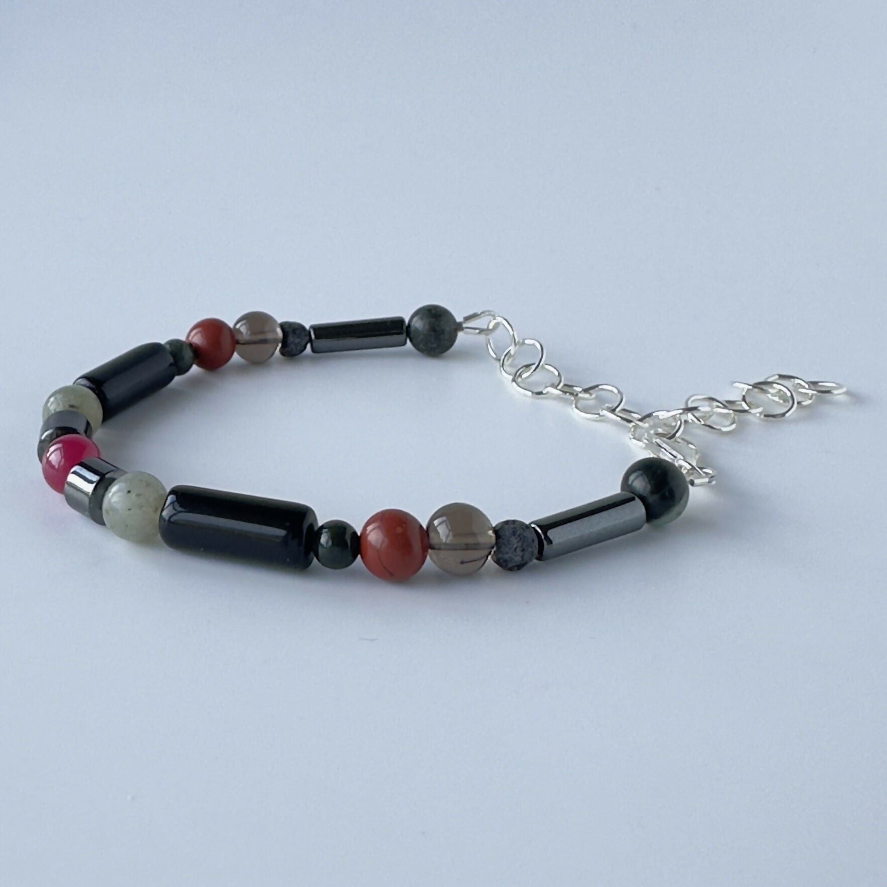 UNISEX HEALING CRYSTAL & STERLING SILVER ROOT CHAKRA BRACELET WITH AROMATHERAPY BEADS