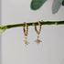 Gold Plated Bead Huggie Earrings with a Tiny Gold Cubic Zirconia Star Charm