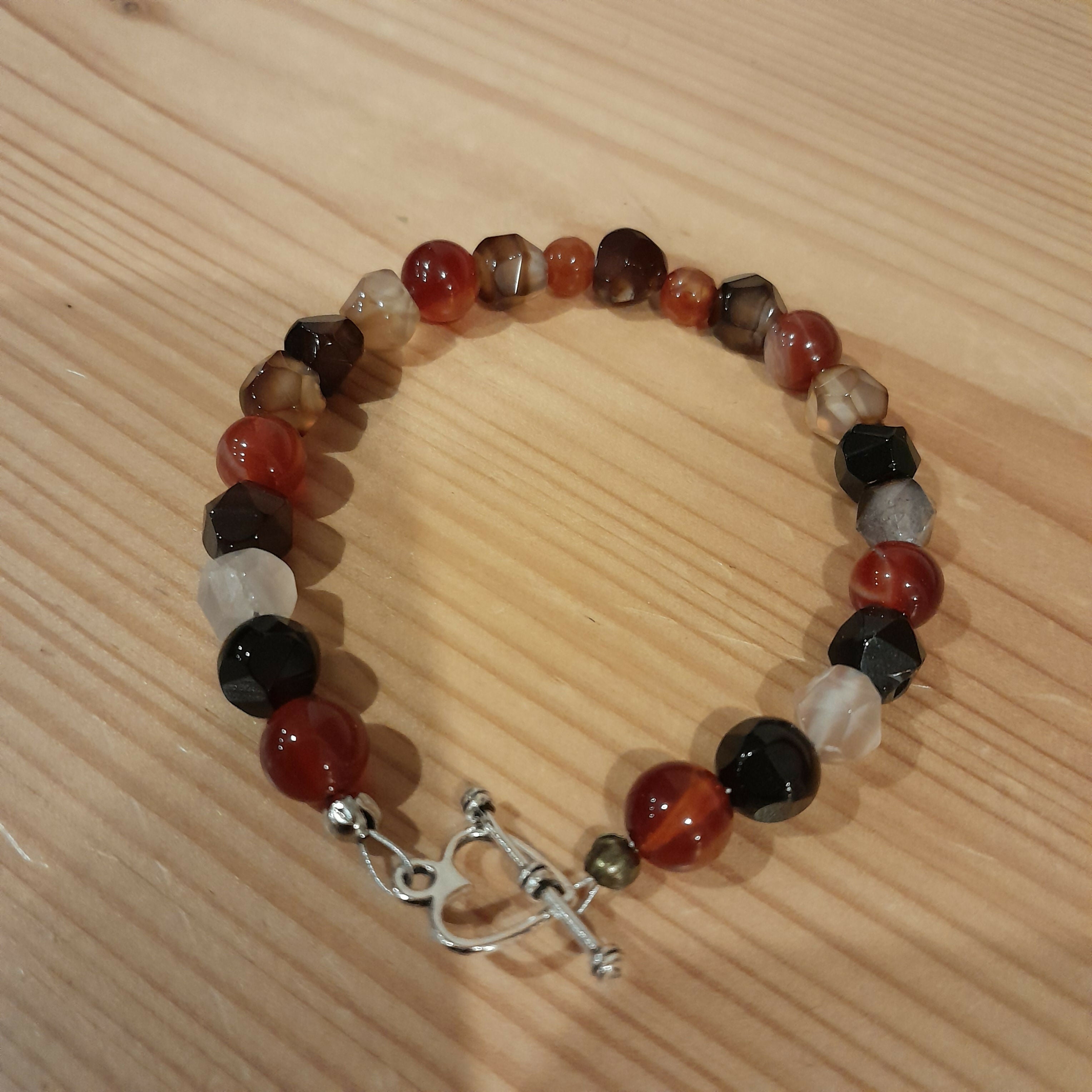Tibetan Silver Toggle Catch Bracelet with Carnelian and Faceted Moha Banded Agate .