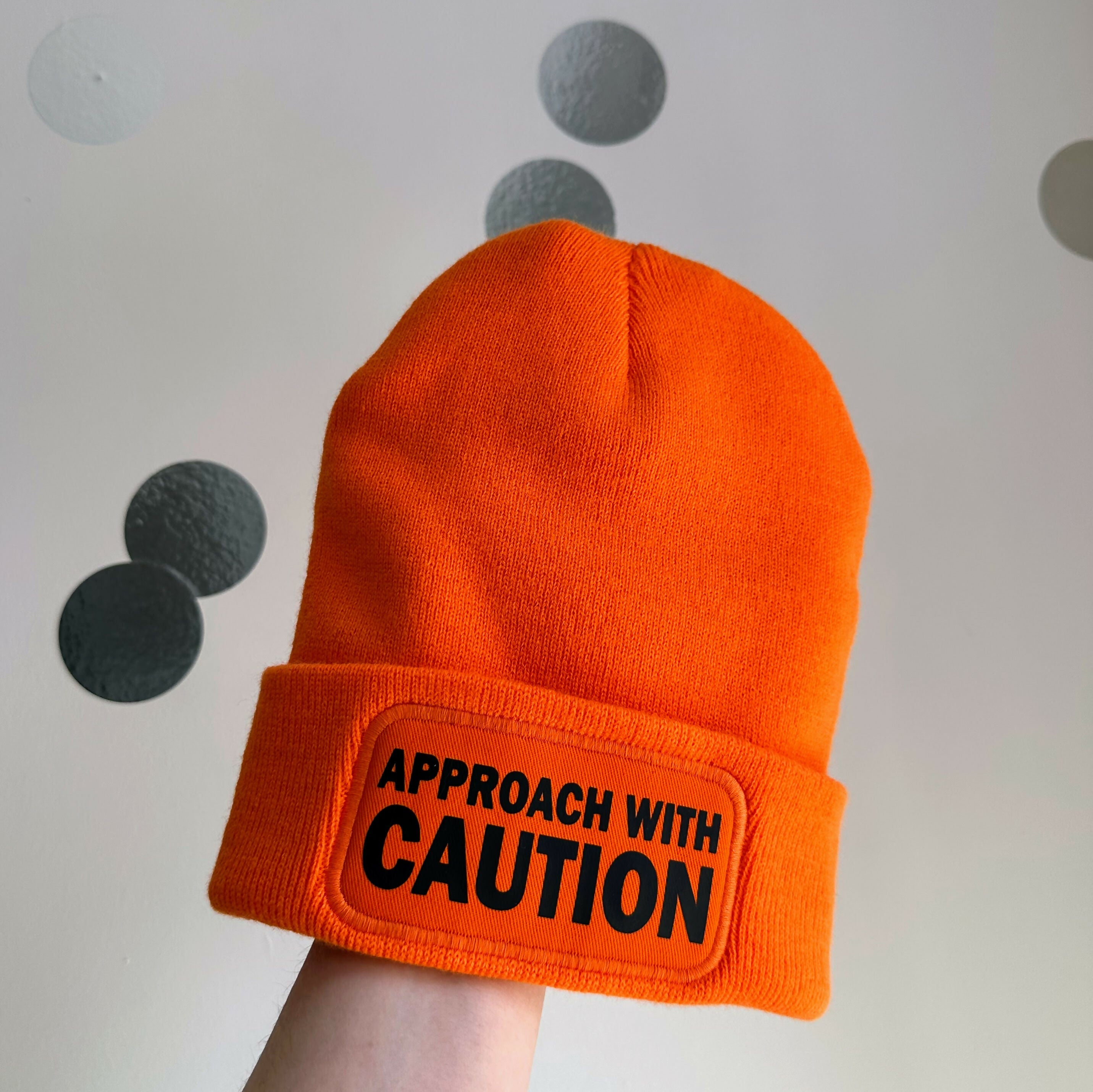 Approach With Caution Cuffed Rectangular Patch Beanie Hat