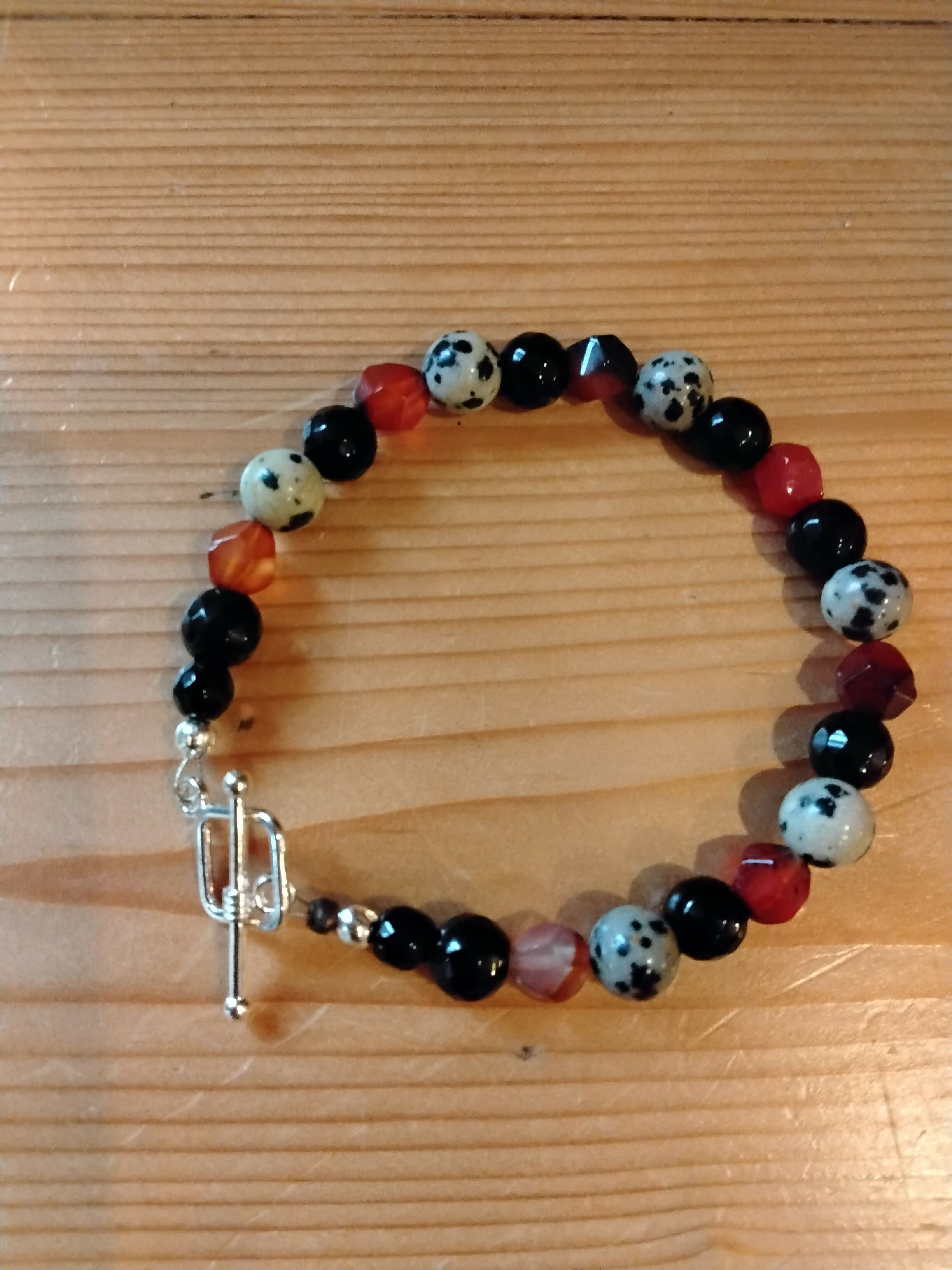 Tibetan Silver Toggle Catch Bracelet with Faceted Onyx, Faceted Carnelian and Dalmatian Jasper.