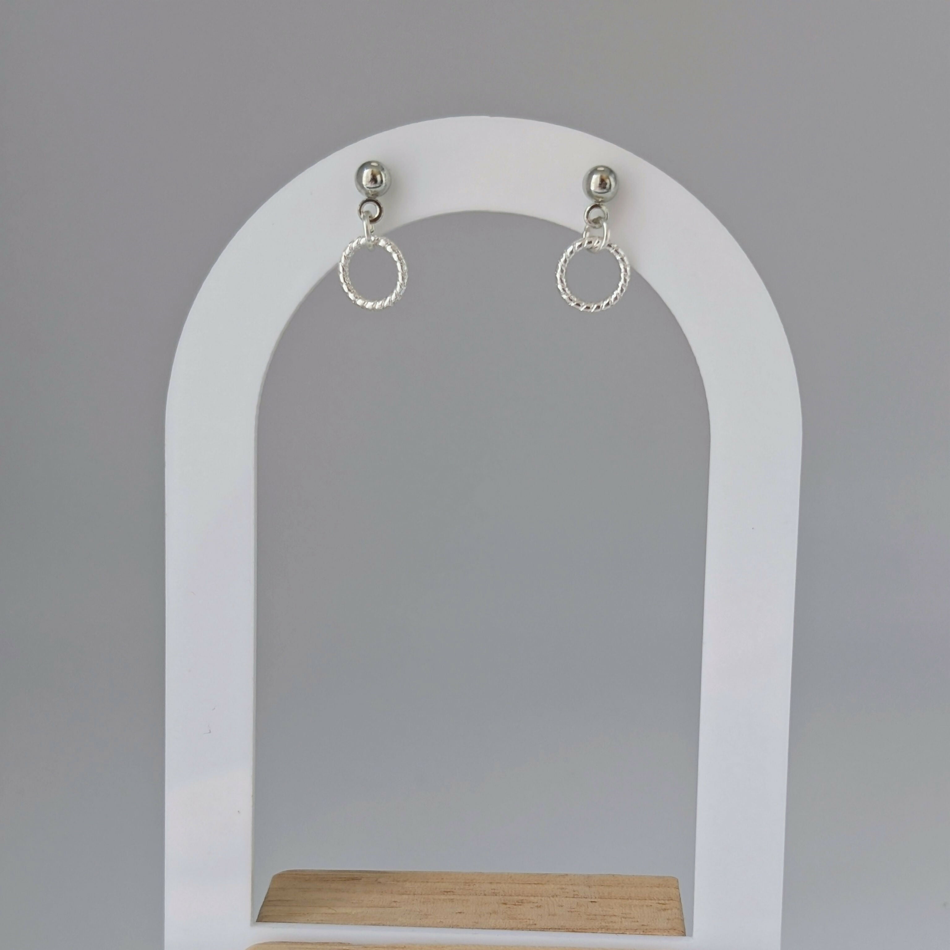 Tiny Silver Minimalist Circle Earrings in Rope Twist Style on a Silver Plated Stud