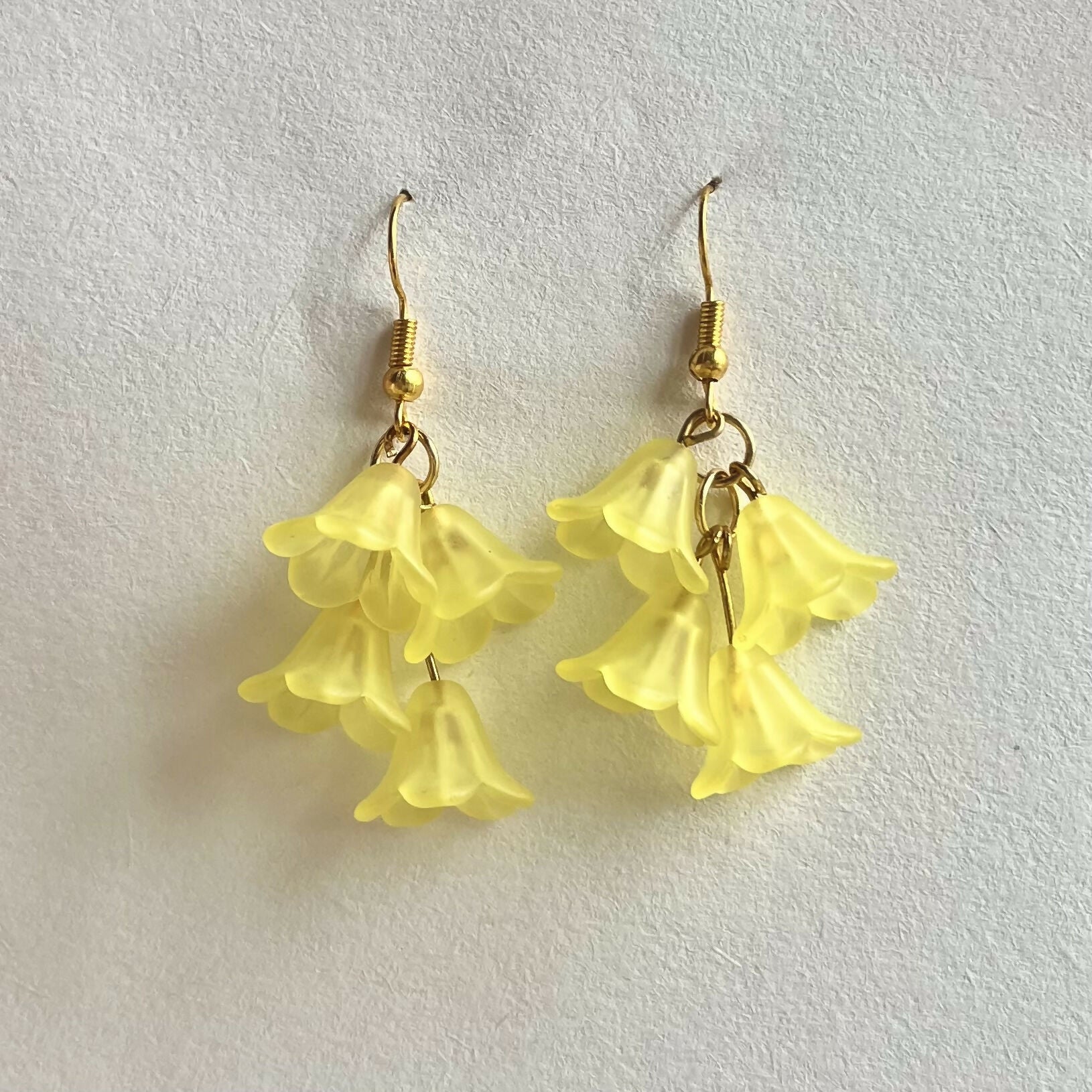 Cascading Yellow Flower Earrings In Gold
