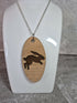 Unique Handcrafted, Oval, Cherry Veneered, Pendant With An Engraved Leaping Hare