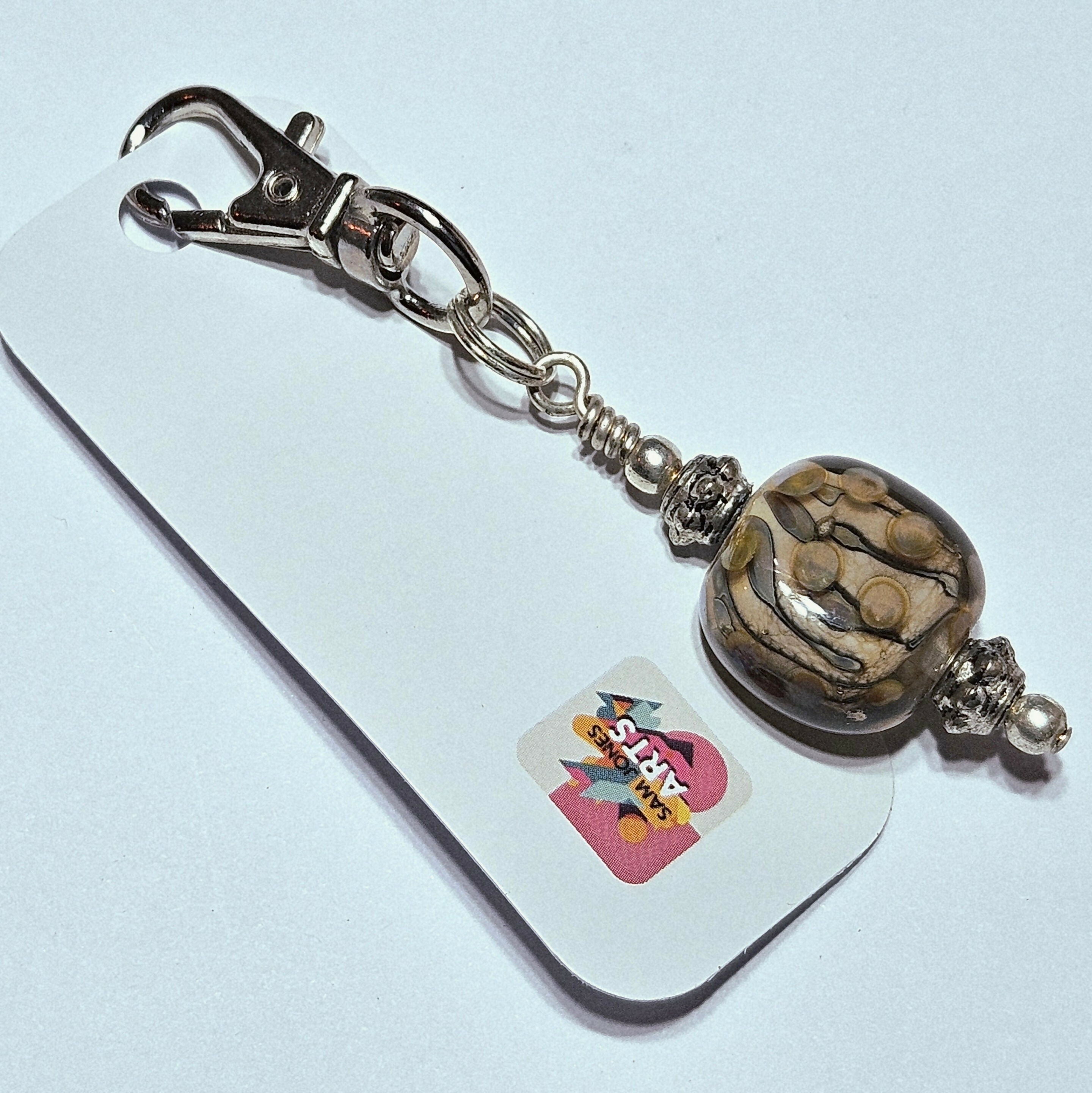 CHARMING GLASS BEADED BAG CHARM/KEYRING.