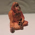 Ceramic orangutan sculpture