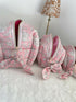 Pink Quilted Toiletry Bag with Zipper with white flower print