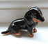 Ceramic Longhaired Black and tan dachshund dog sculpture