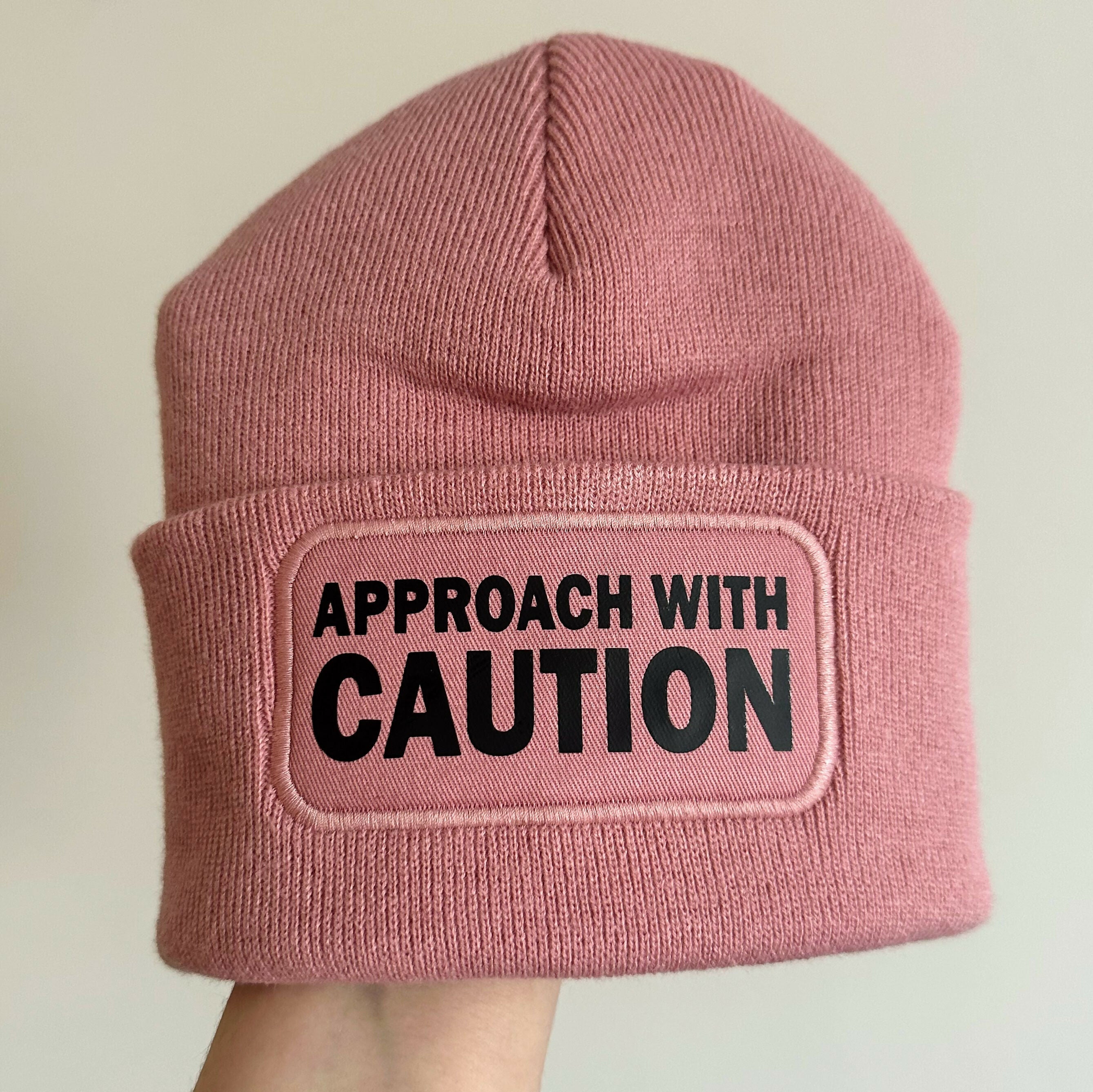 Approach With Caution Cuffed Rectangular Patch Beanie Hat