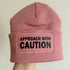 Approach With Caution Cuffed Rectangular Patch Beanie Hat