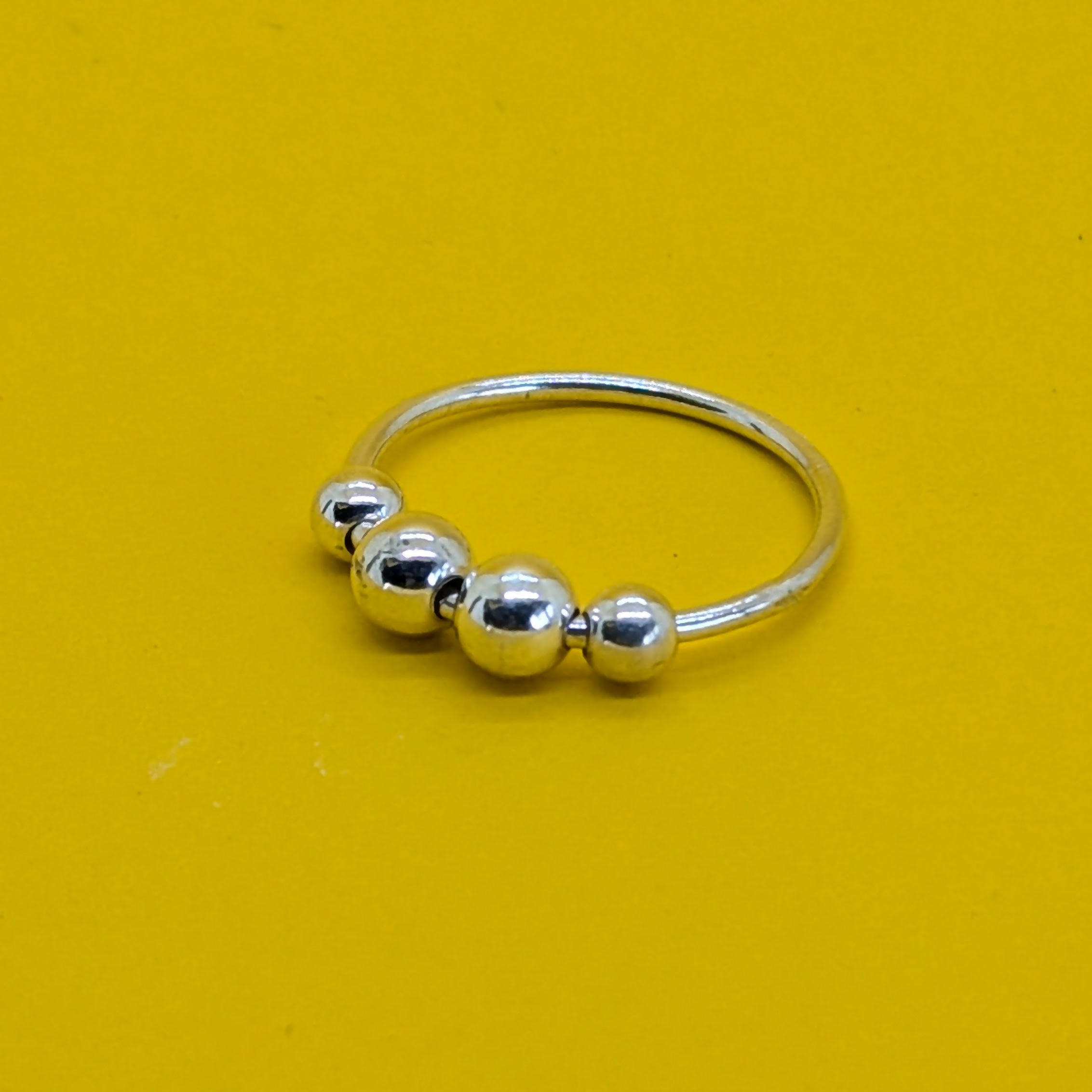 ‘Orbit’ Sterling Silver Polished Bead Fidget Ring