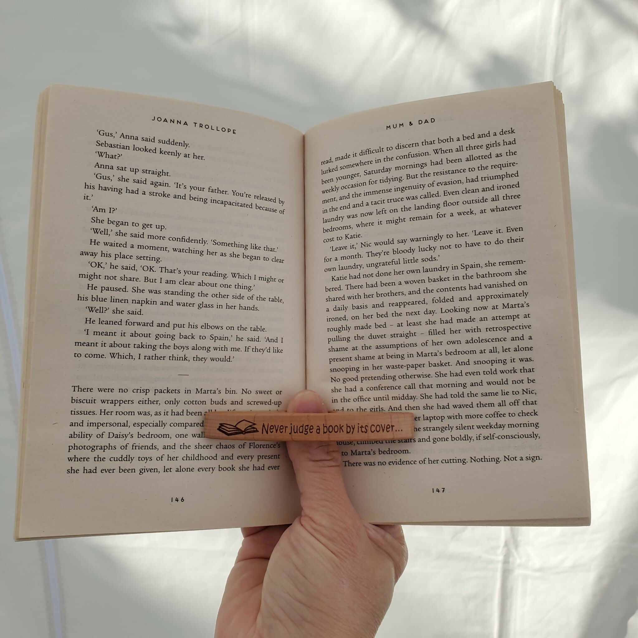 Wooden Thumb Bookmark Book Holder - Never judge a book by its cover
