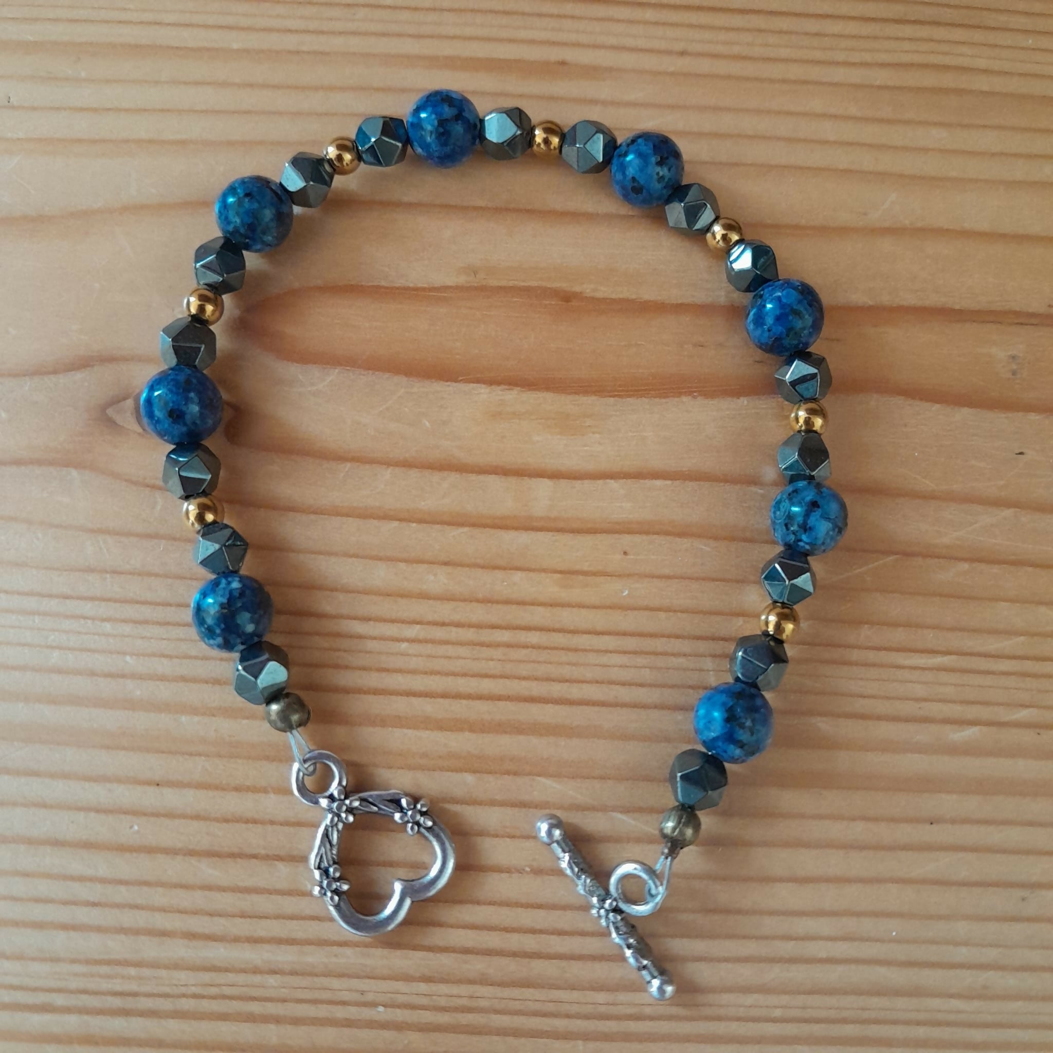 Tibetan Silver toggle Bracelet with Faceted Grey Hematite, Blue Spot Jasper and Bronze Hematite.