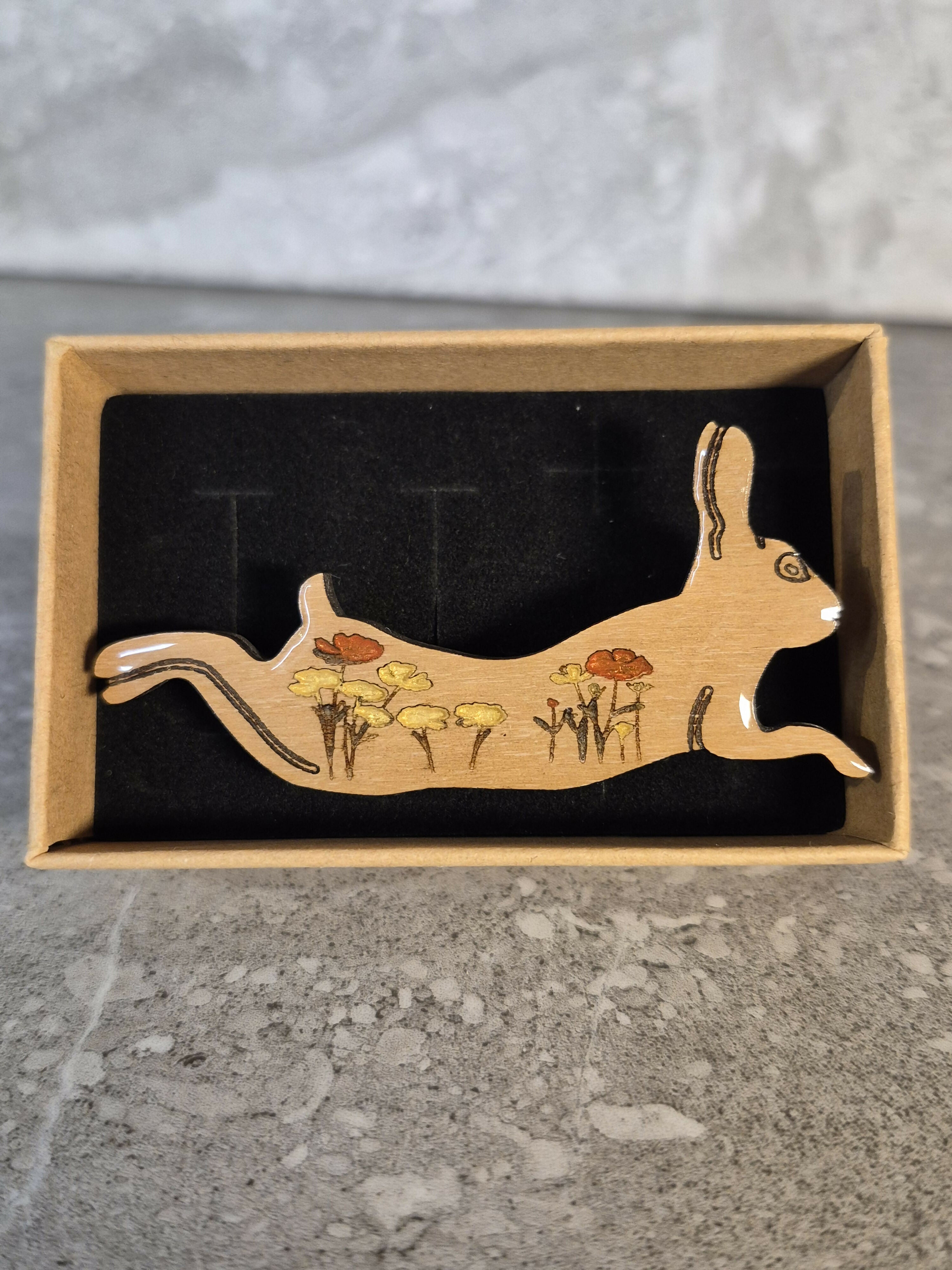 Handcrafted Cherry Veneered Leaping Hare Pin with Flower Decoration