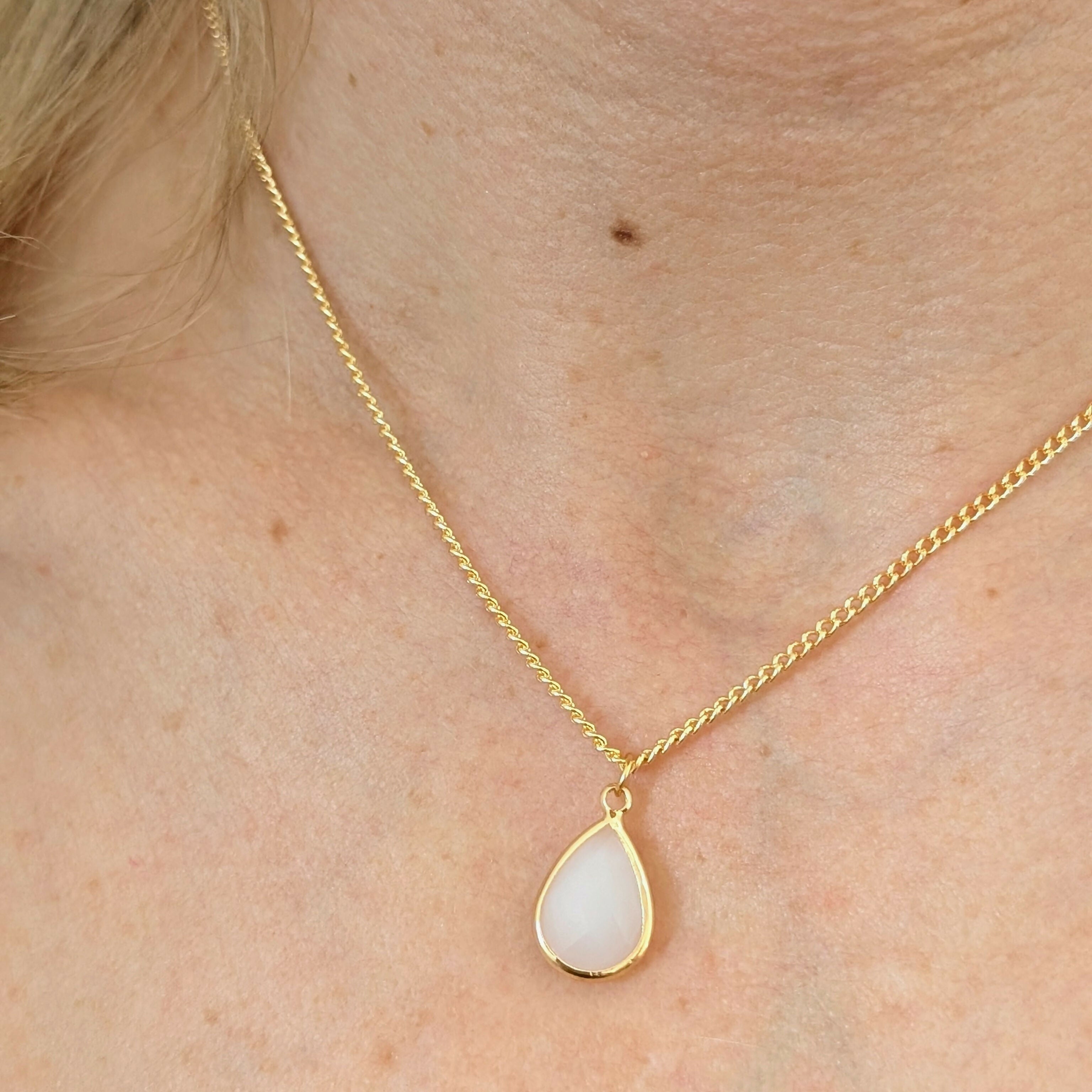 White Jade Faceted Teardop Charm Necklace on a Gold Plated Chain
