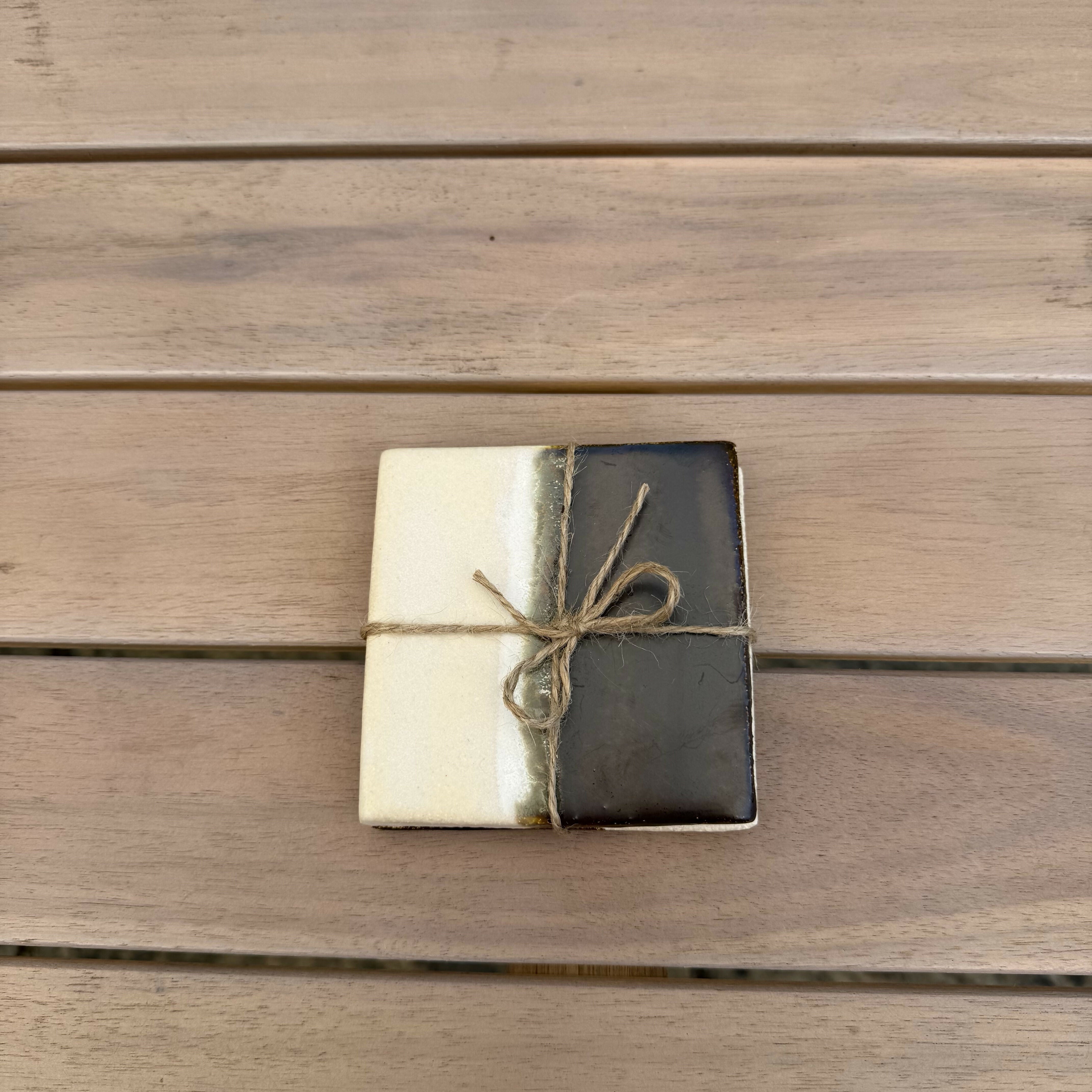 Contemporary style pair of coasters