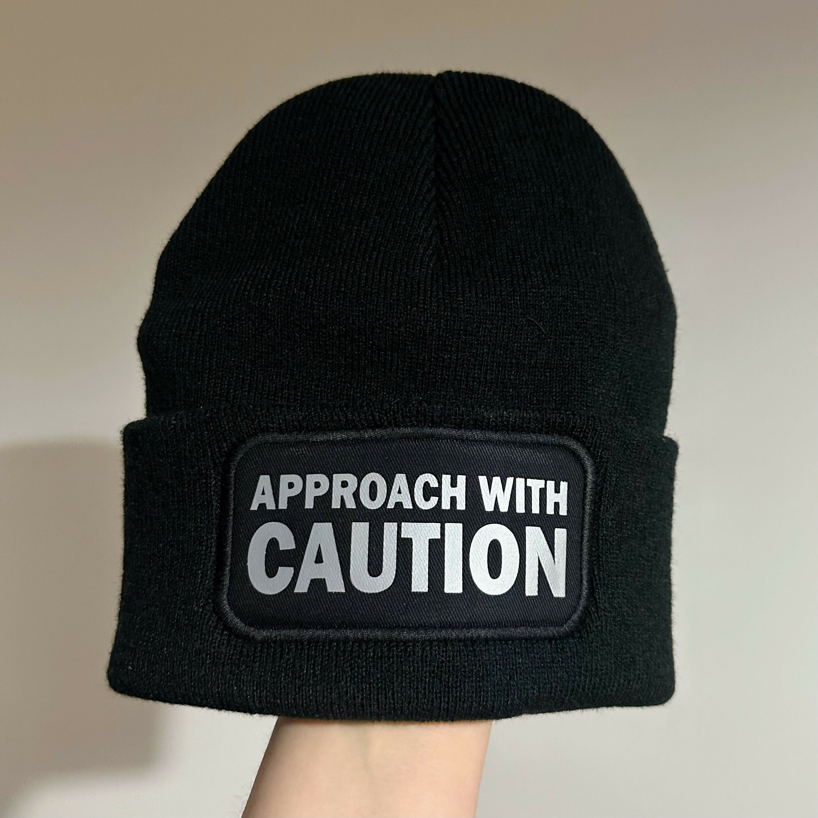 Approach With Caution Cuffed Rectangular Patch Beanie Hat