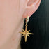 Large Gold North Star Earrings on a Gold Plated Half Loop Huggie Stud