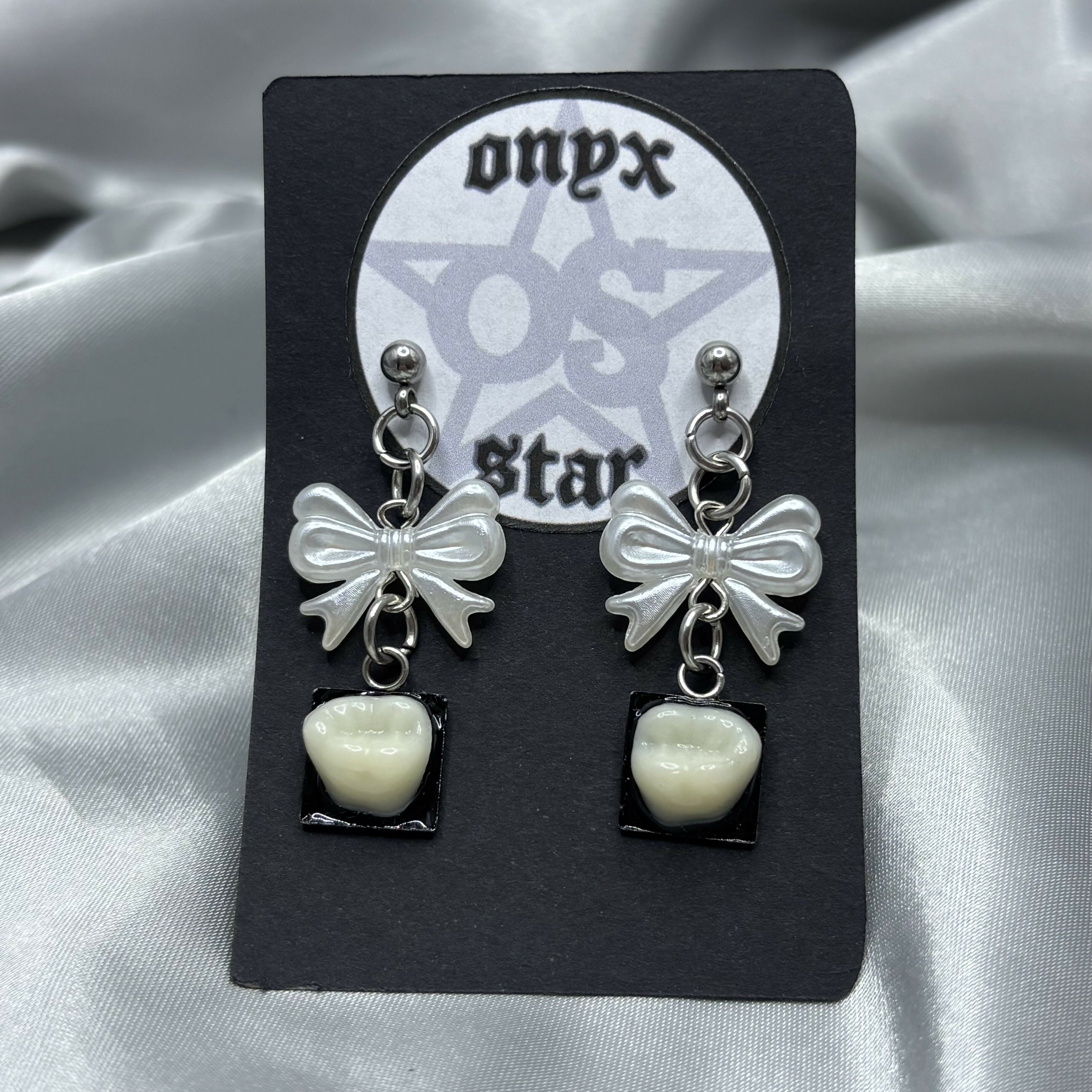Square Tooth and White Bow Earrings