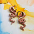 Handmade Dusky Pink And Gold Snake Resin Charms On Chunky Hoops