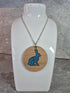 Unique Handcrafted Round Pendant Showing a Seated Hare