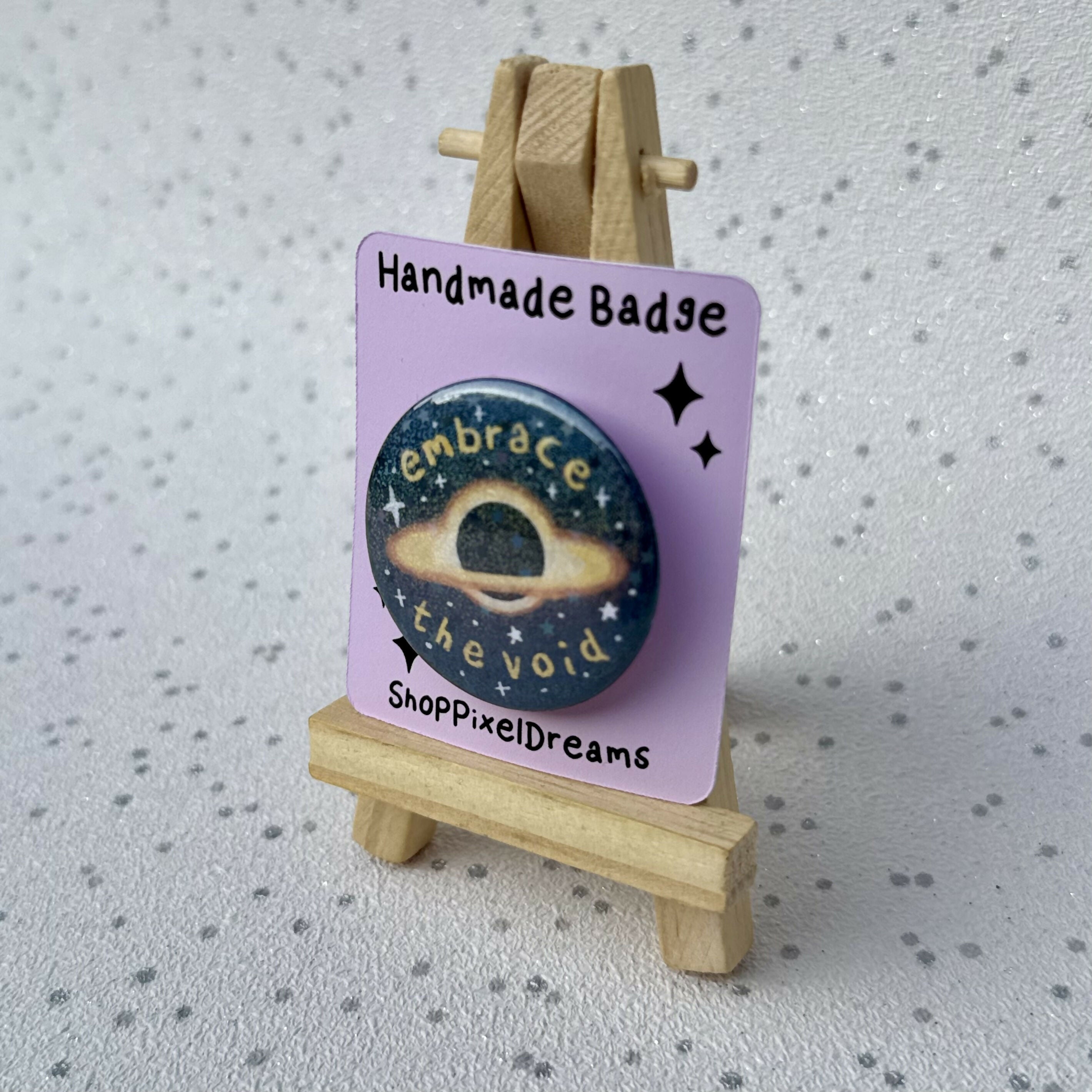 Embrace the Void Black Hole Sparkly Holographic Pin Badge