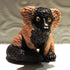 Ceramic Red ruffed lemur sculpture