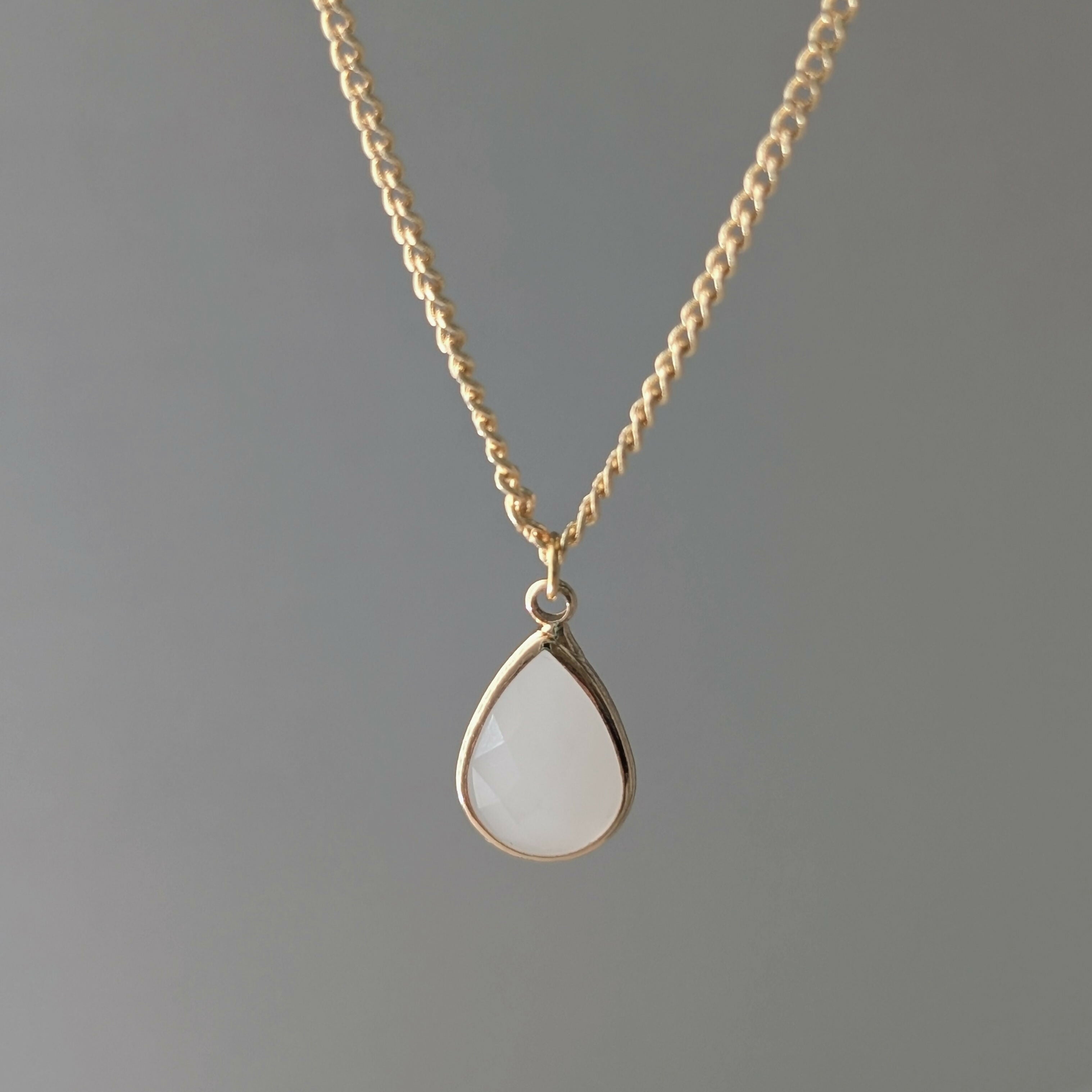 White Jade Faceted Teardop Charm Necklace on a Gold Plated Chain