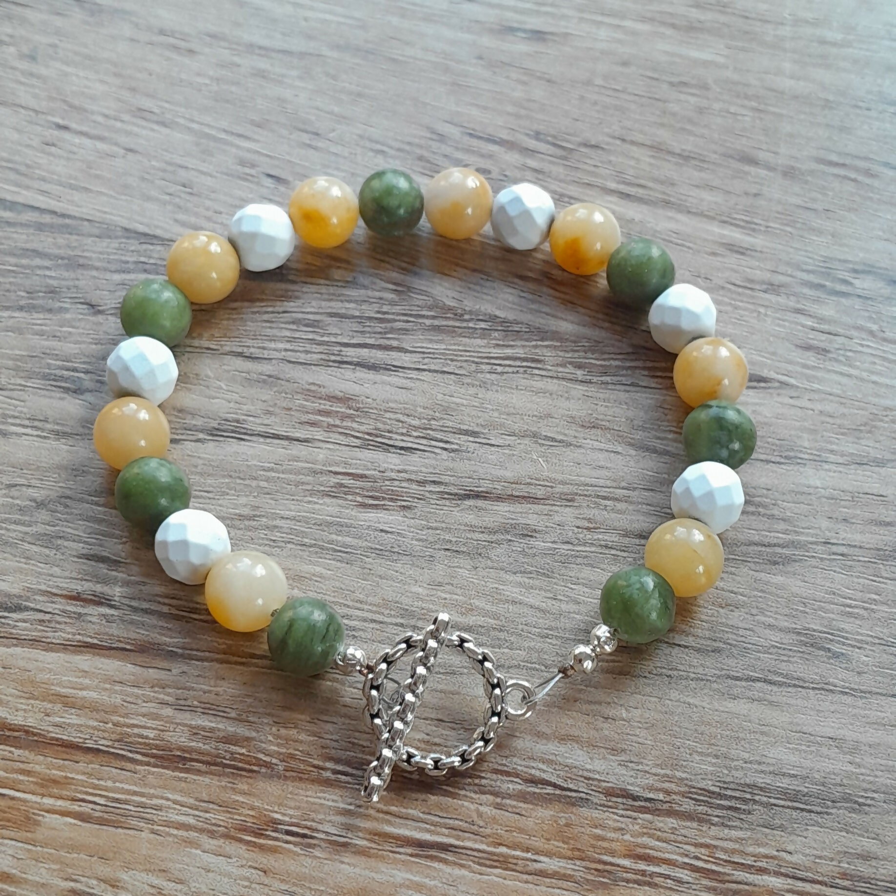 Tibetan Silver Toggle Clasp Bracelet with Green Jade, Yellow Jade and Faceted Howlite.