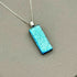 Ice Blue Dichroic Fused Glass Pendant with Silver Plated Chain - Handmade by Jade Tapson Glass.