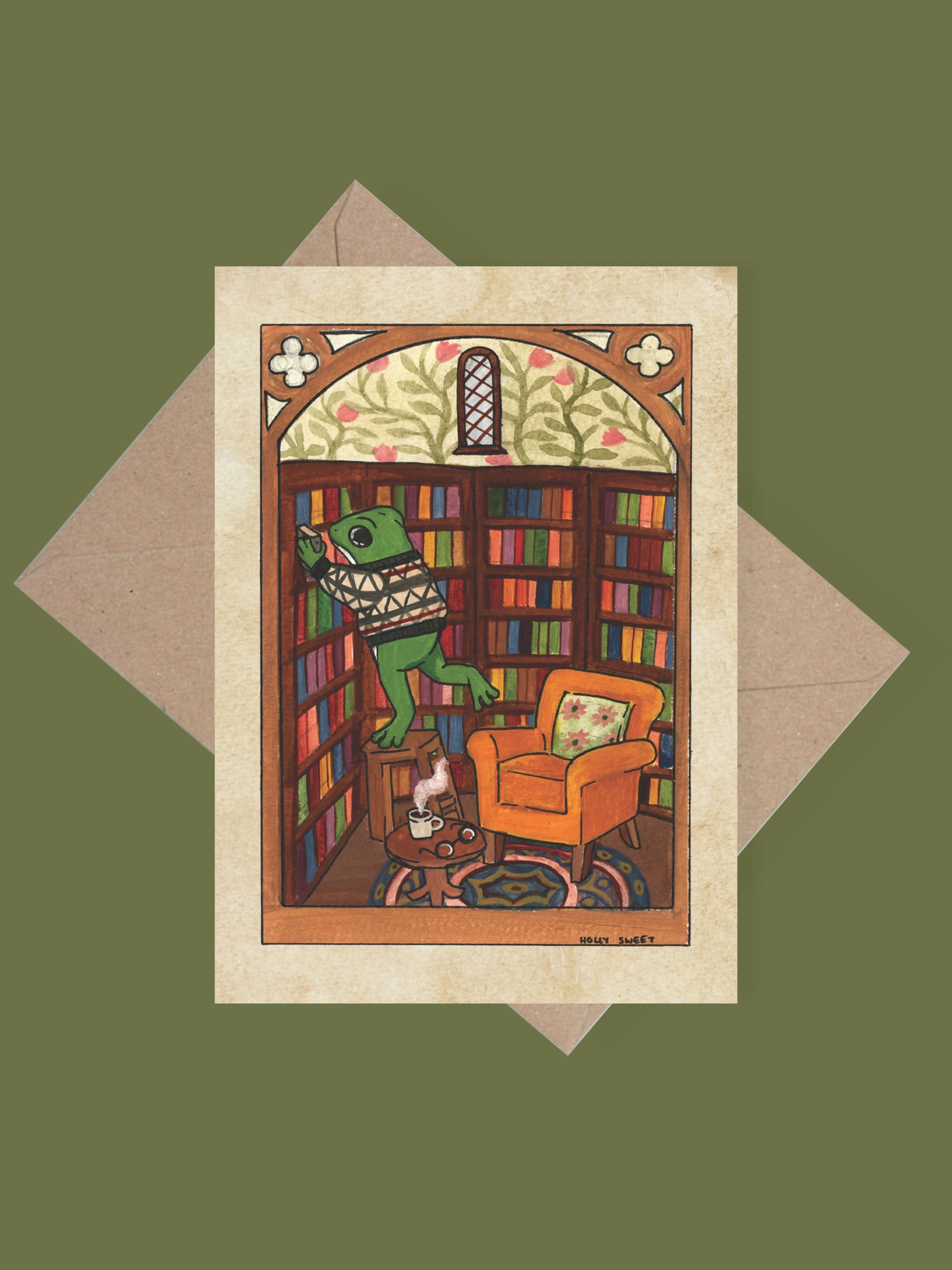 Frog in a Library Cosy Greetings Card