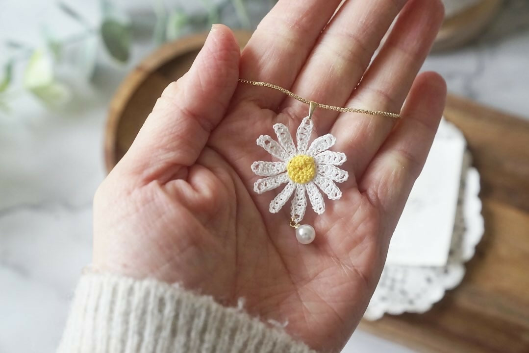 White Daisy Flower with Pearl Necklace